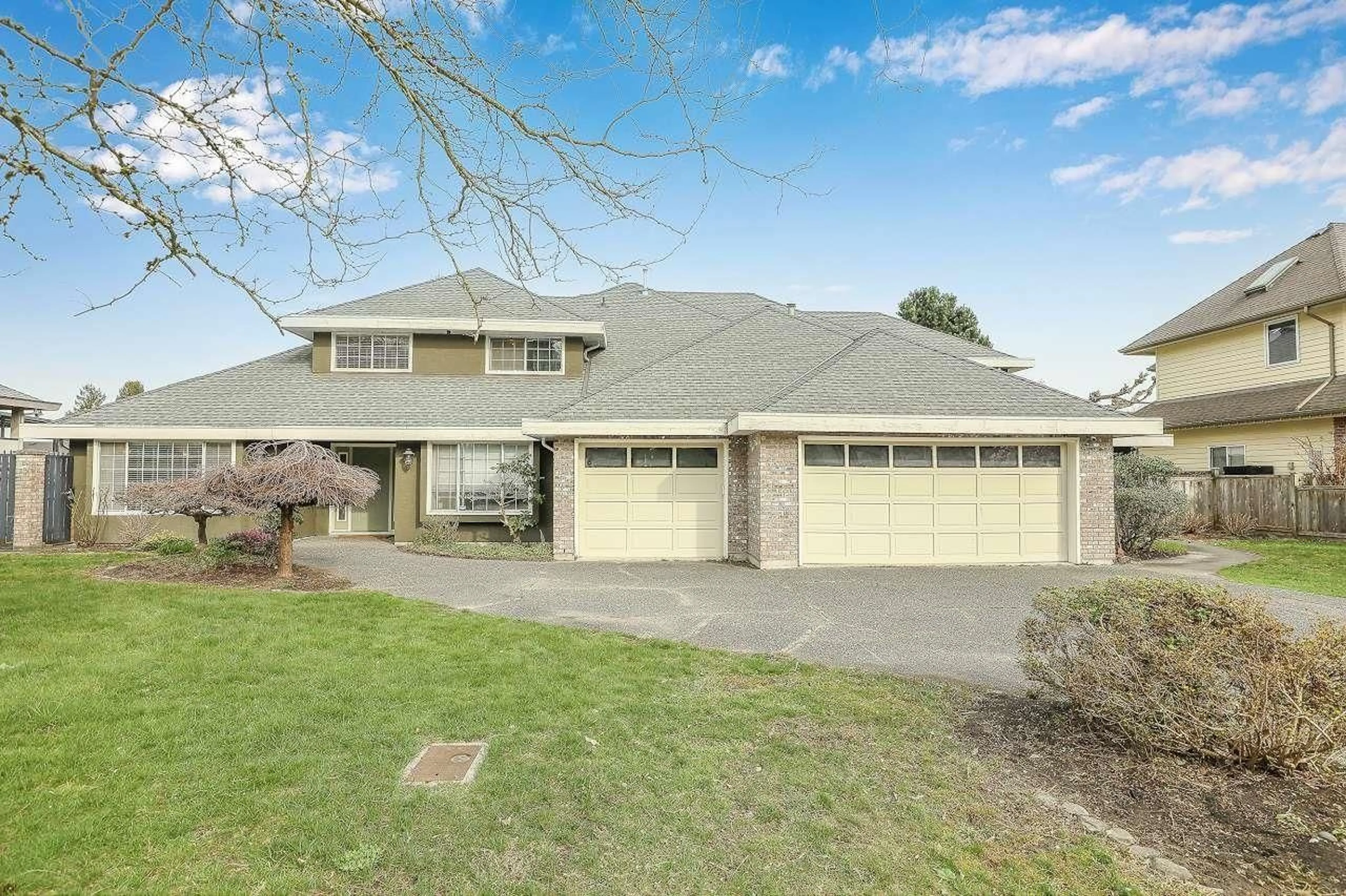 Home with vinyl exterior material, street for 9312 163 STREET, Surrey British Columbia V4N3C9