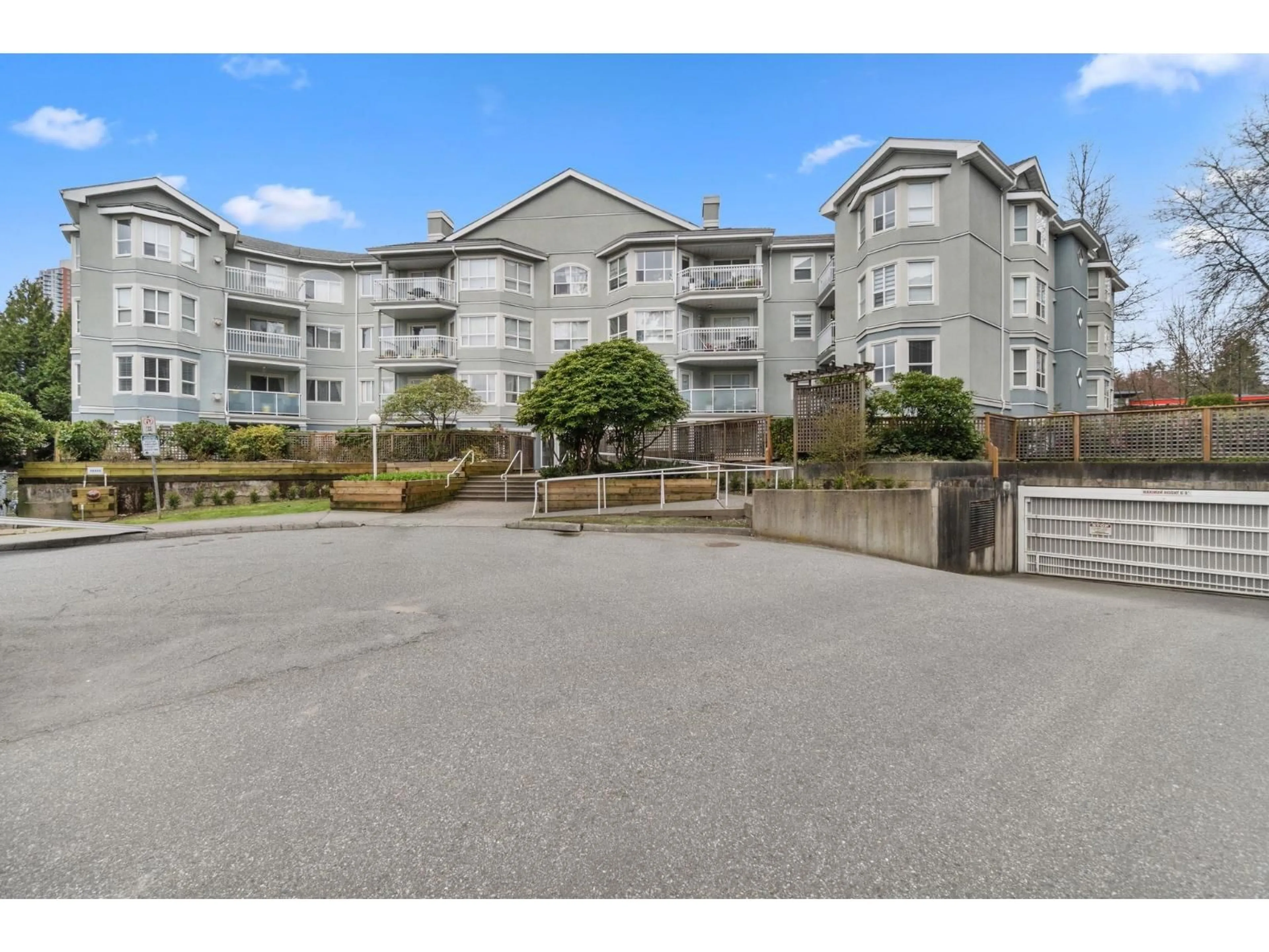 A pic from outside/outdoor area/front of a property/back of a property/a pic from drone, unknown for 405 - 13955 LAUREL DRIVE, Surrey British Columbia V3T1A8