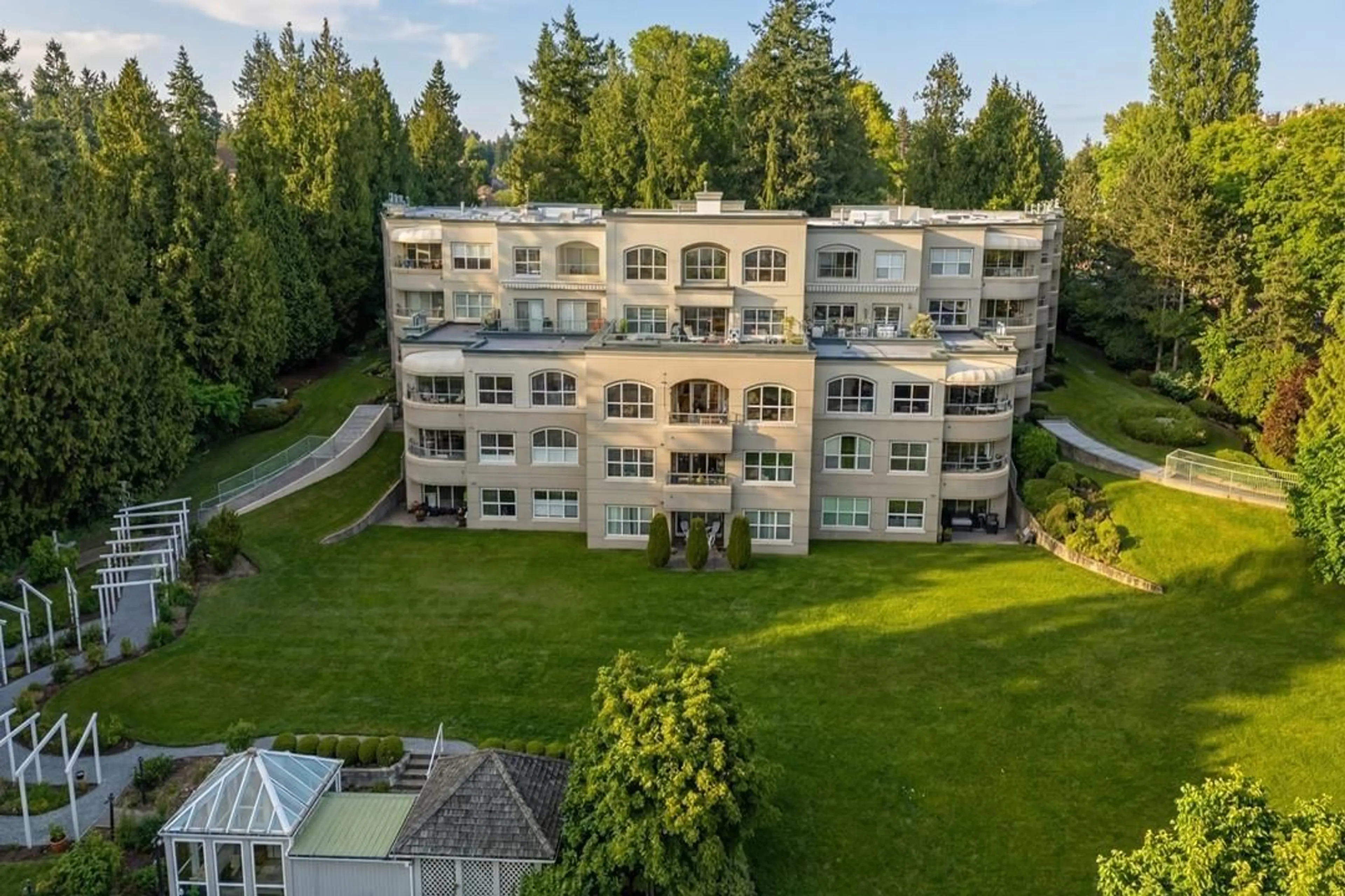 A pic from outside/outdoor area/front of a property/back of a property/a pic from drone, building for 301 - 1725 128 STREET, Surrey British Columbia V4A3V2