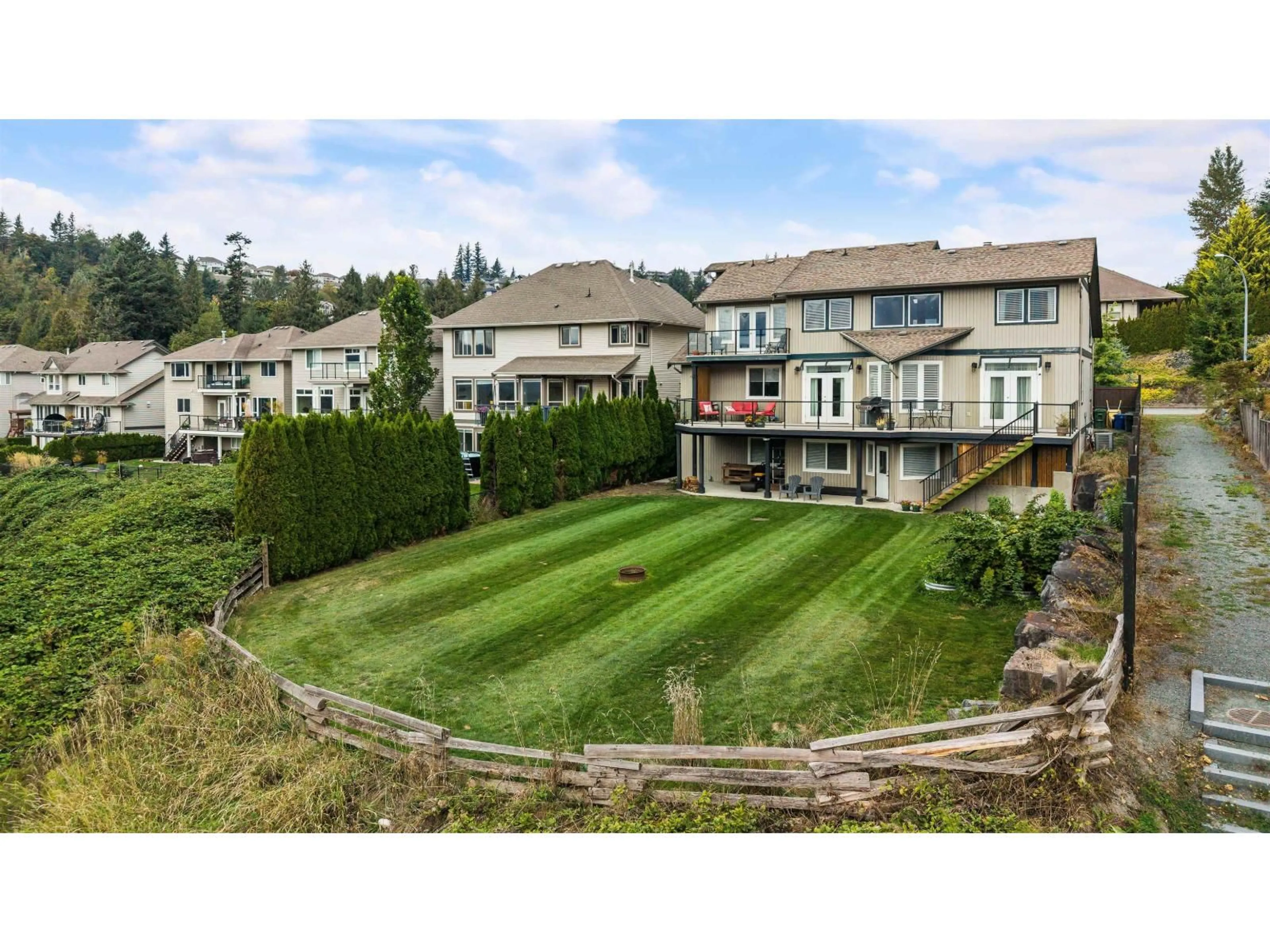 A pic from outside/outdoor area/front of a property/back of a property/a pic from drone, mountain view for 46052 BRIDLE RIDGE CRESCENT, Chilliwack British Columbia V2R5W2