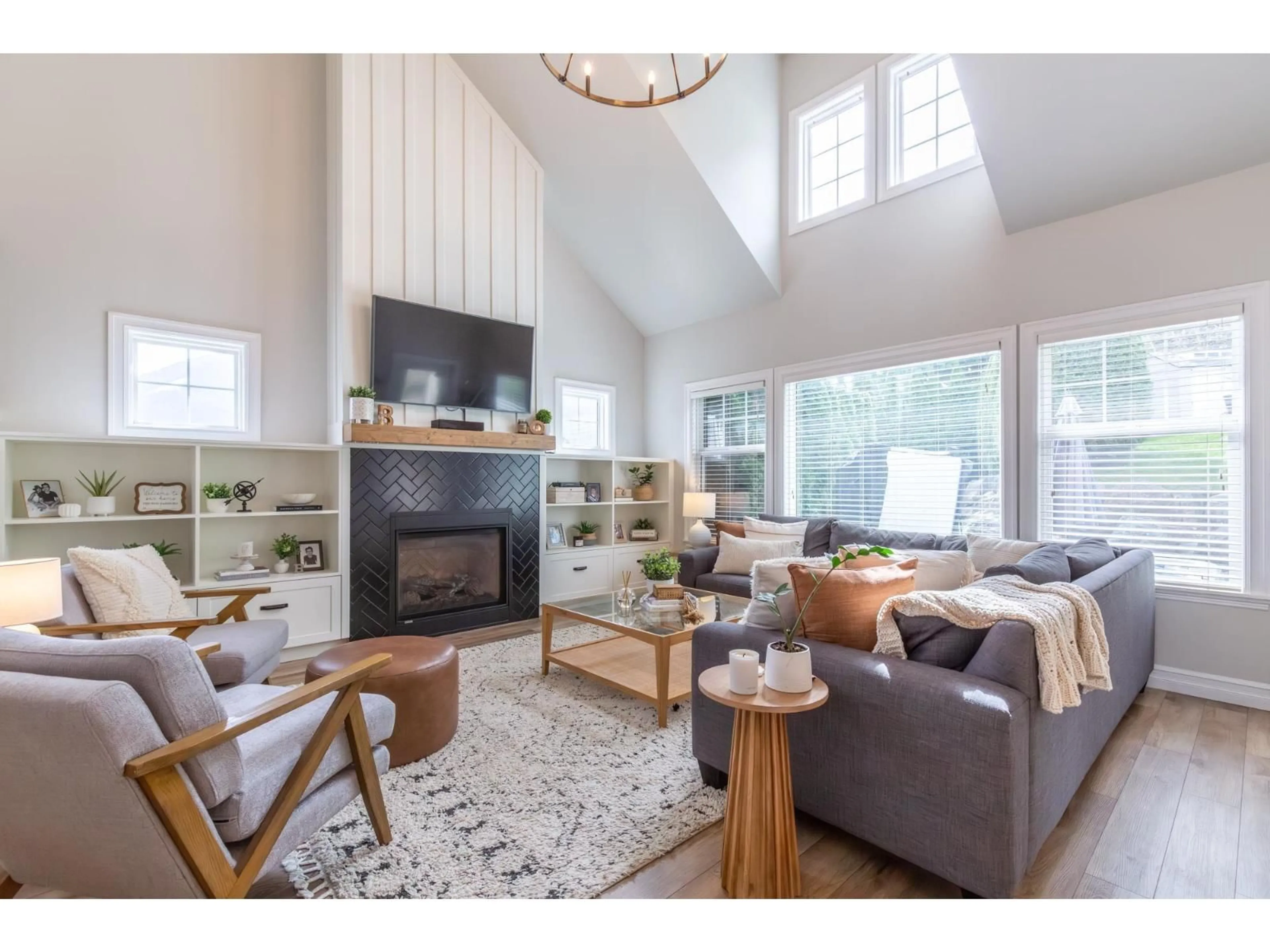 Living room with furniture, wood/laminate floor for 5217 WEEDEN PLACE, Chilliwack British Columbia V2R5T9