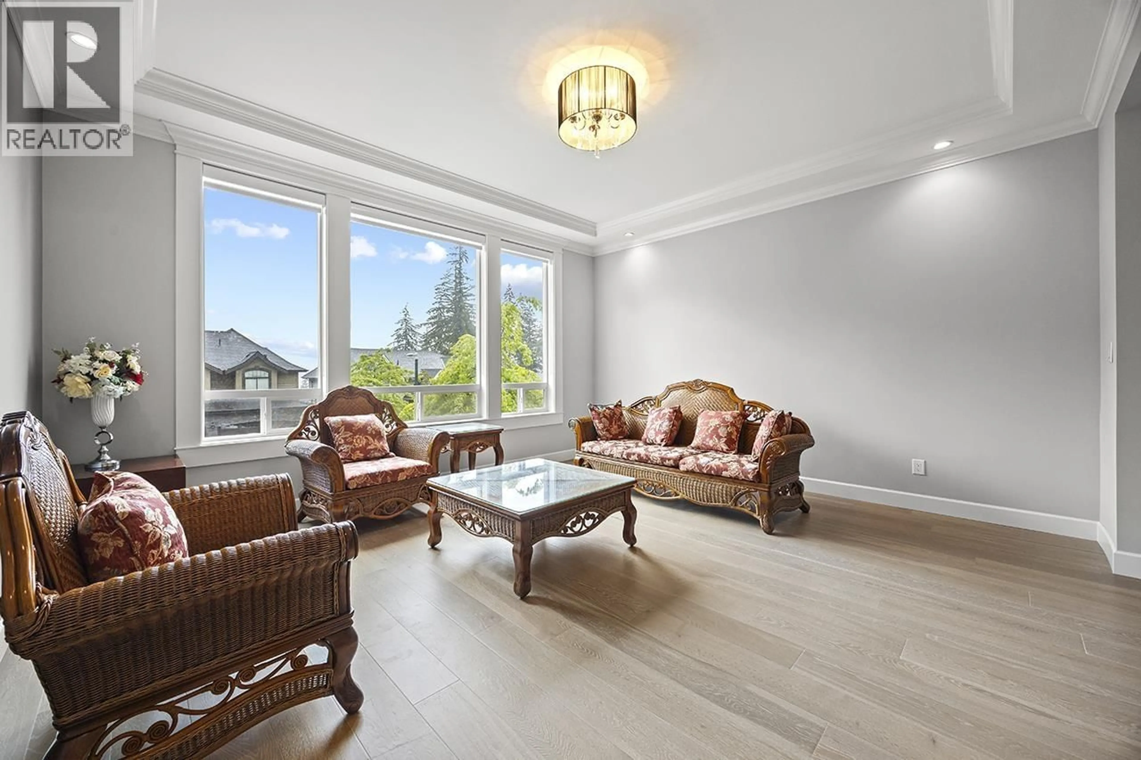 Living room with furniture, wood/laminate floor for 3483 WALES AVENUE, Coquitlam British Columbia V3E0K5