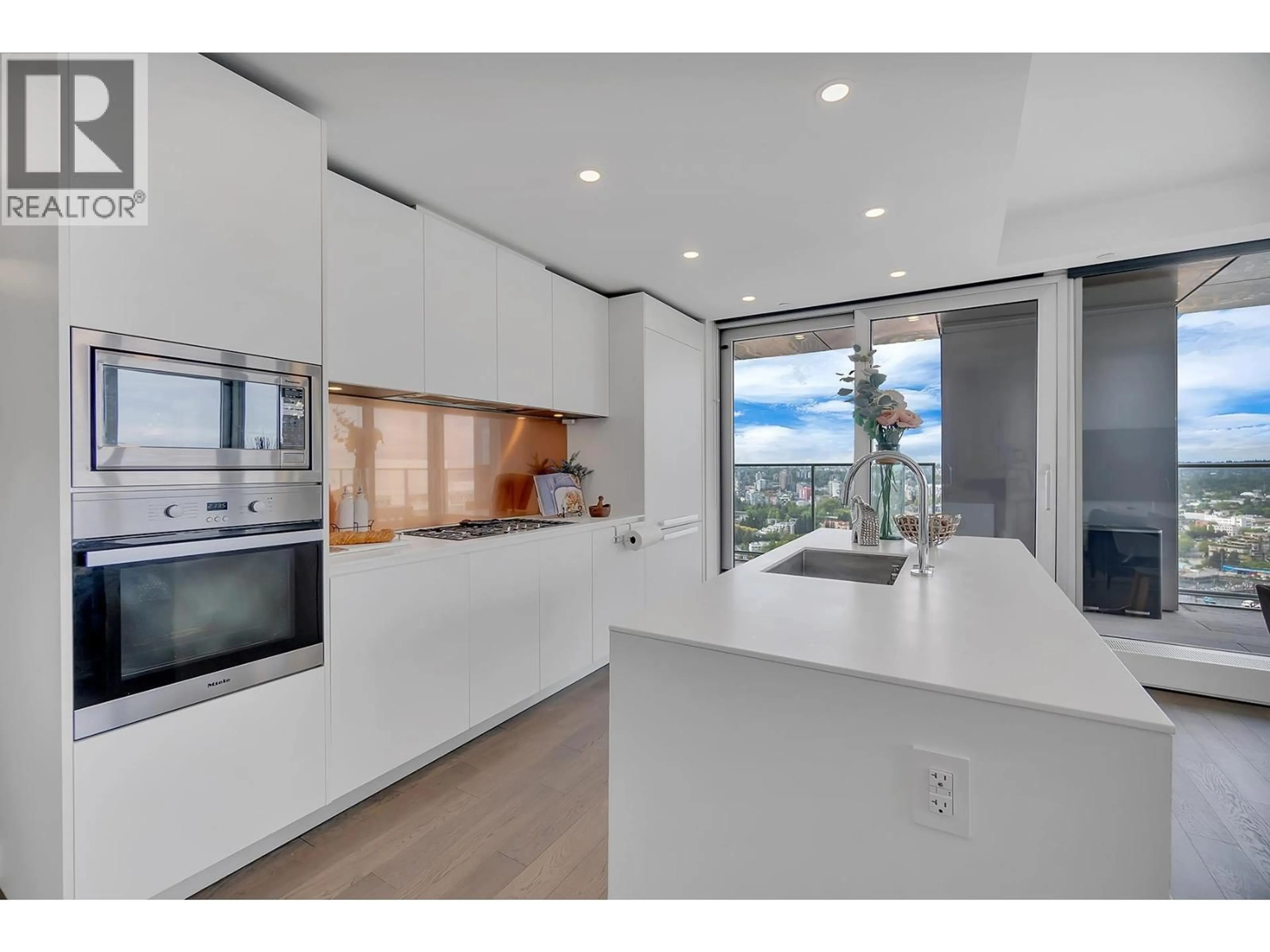 Open concept kitchen, unknown for 3602 - 1480 HOWE STREET, Vancouver British Columbia V6Z0G5