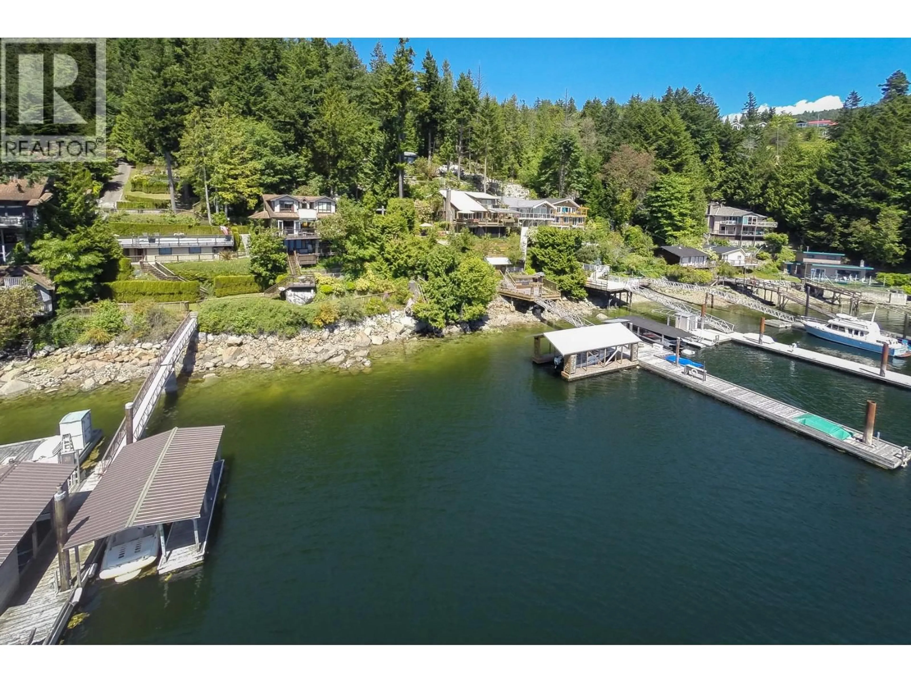 A pic from outside/outdoor area/front of a property/back of a property/a pic from drone, water/lake/river/ocean view for 4836 SINCLAIR BAY ROAD, Pender Harbour British Columbia V0N1S1