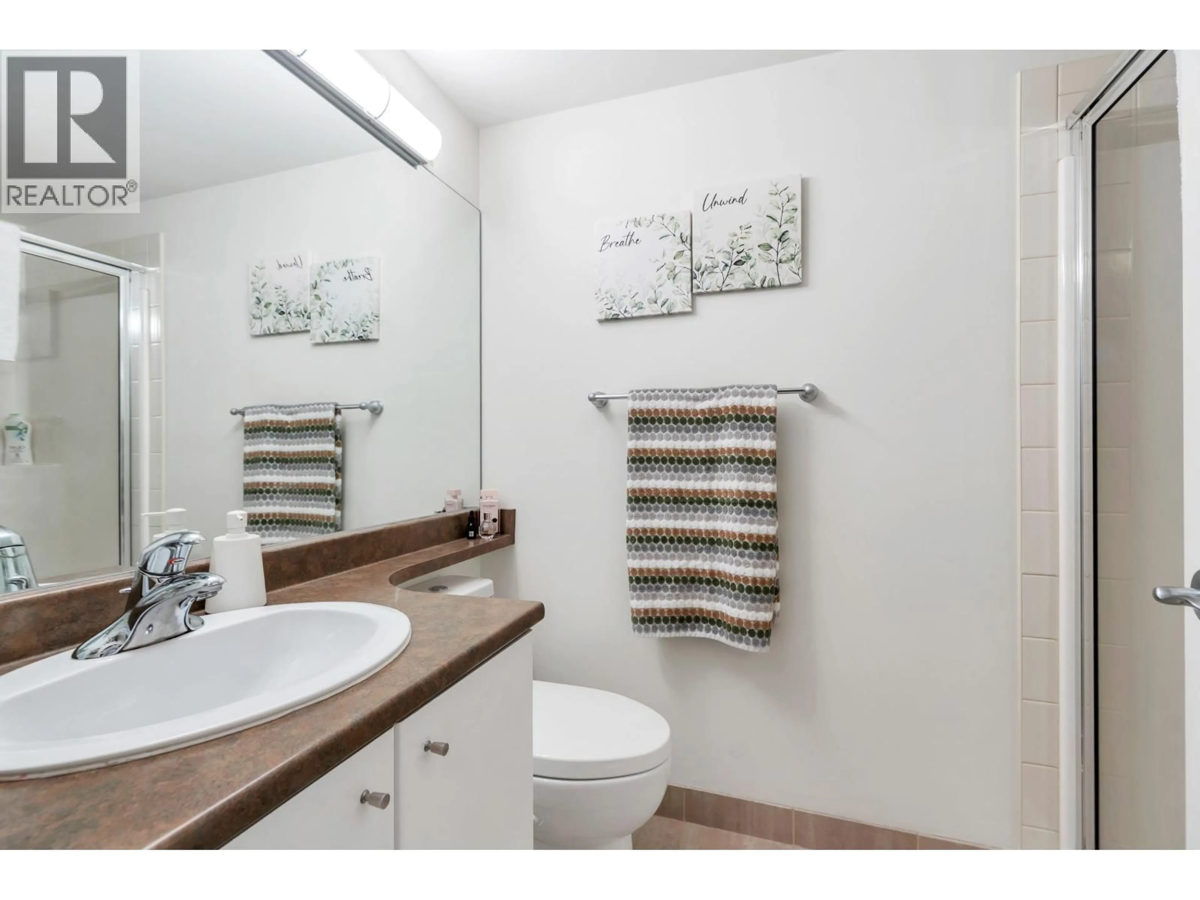 Standard bathroom, ceramic/tile floor for 102 - 736 W 14TH AVENUE, Vancouver British Columbia V5Z1P9