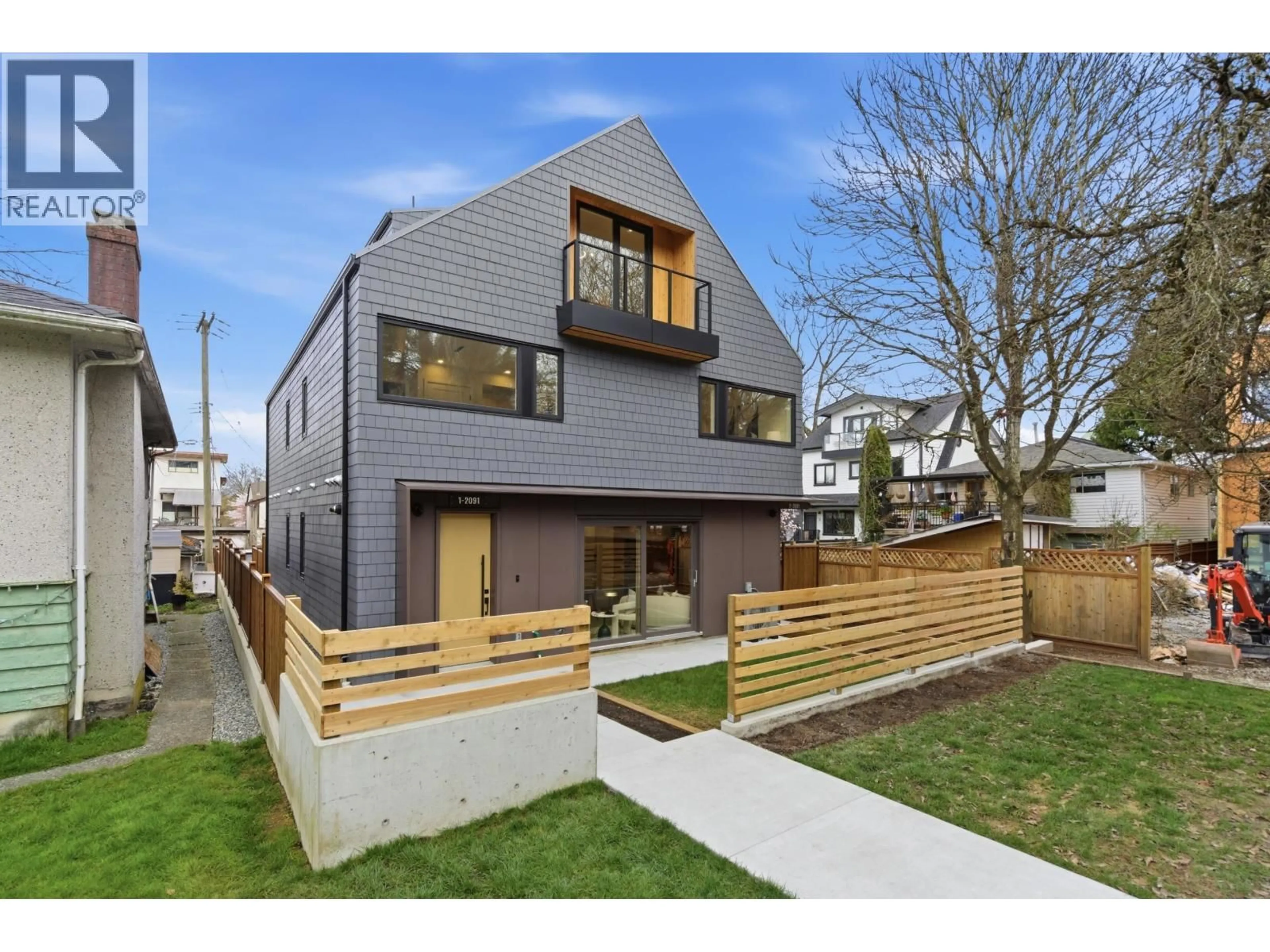 Home with brick exterior material, street for 1 - 2091 20TH AVENUE, Vancouver British Columbia V5N2L1