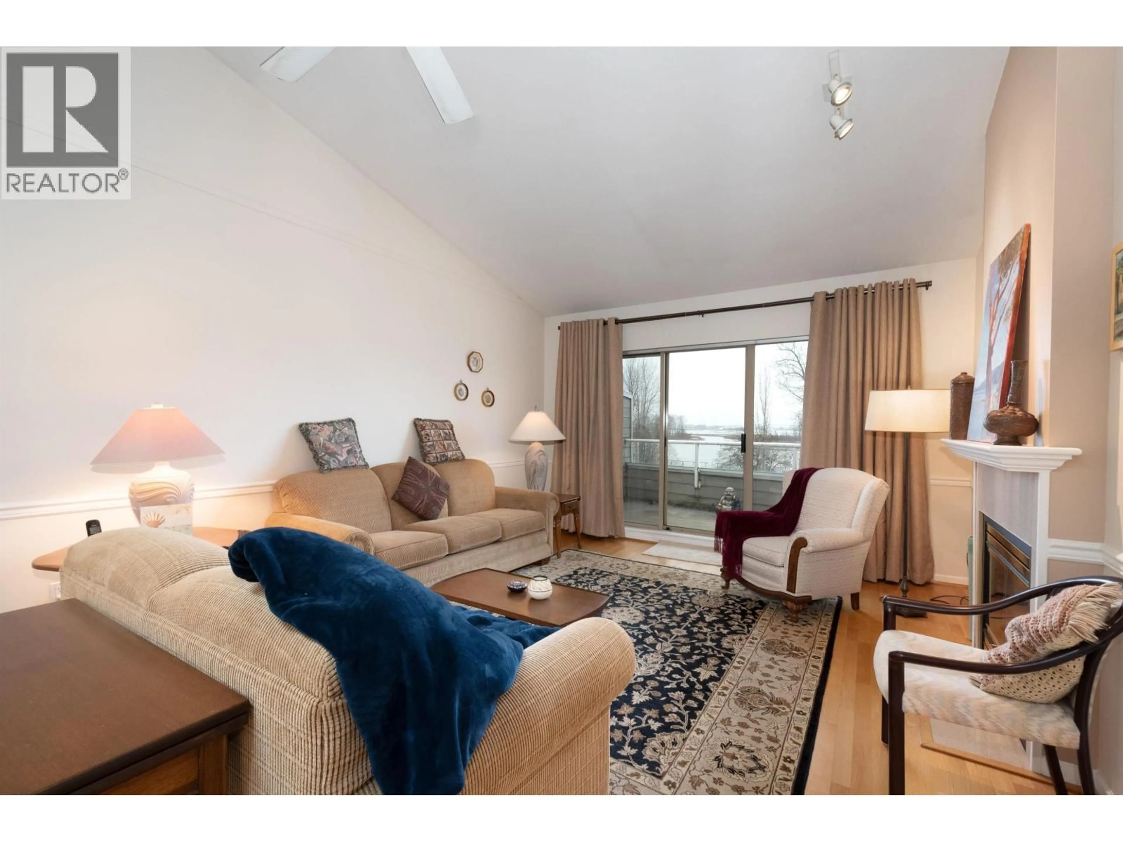 Living room with furniture, wood/laminate floor for 22 - 323 GOVERNORS COURT, New Westminster British Columbia V3L5S6