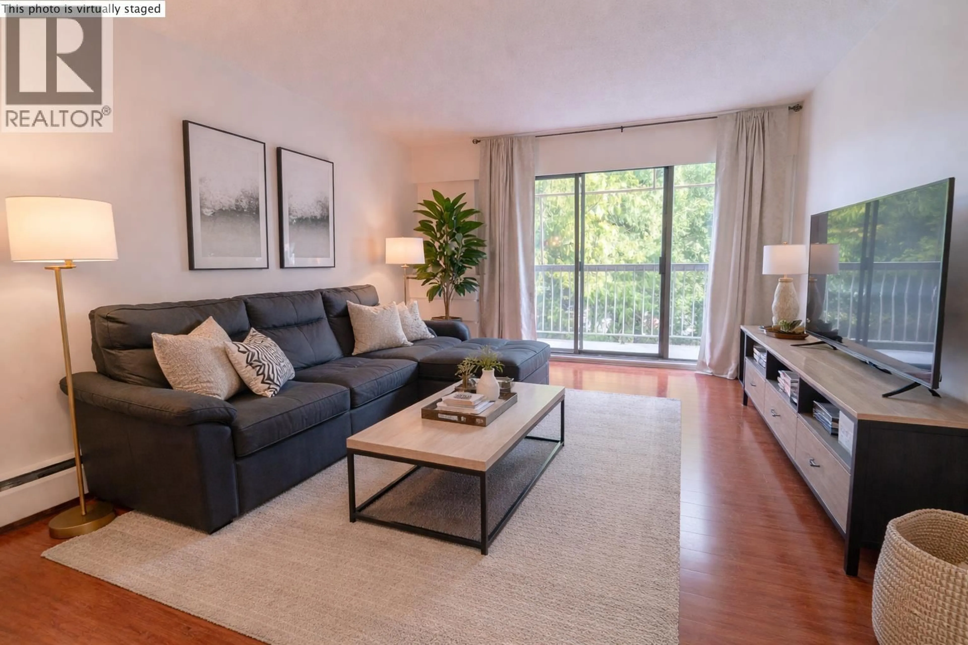 Living room with furniture, wood/laminate floor for 308 - 7428 19TH AVENUE, Burnaby British Columbia V3N1E1