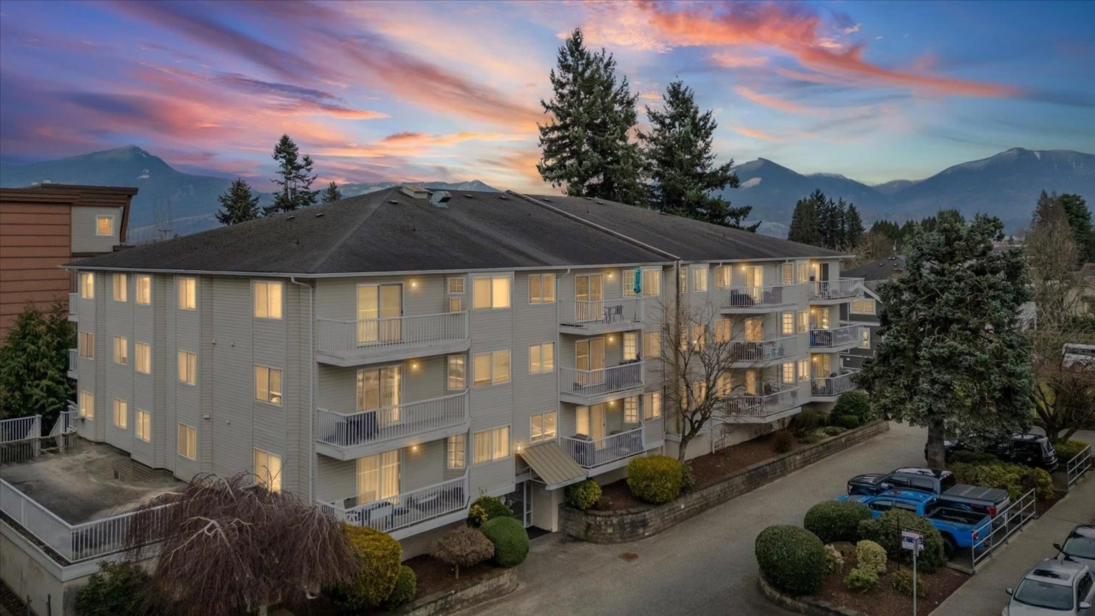 A pic from outside/outdoor area/front of a property/back of a property/a pic from drone, mountain view for 103 - 8934 MARY STREET, Chilliwack British Columbia V2P4J3