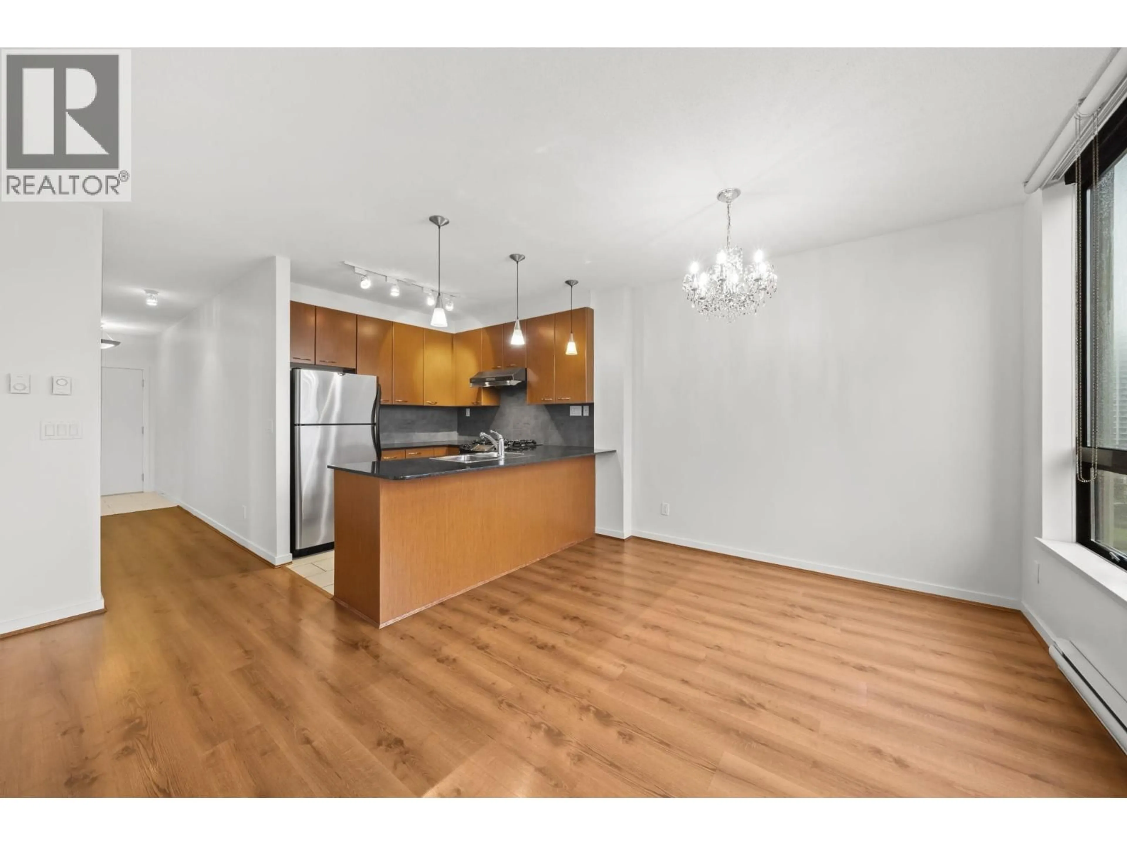 Open concept kitchen, wood/laminate floor for 609 - 7138 COLLIER STREET, Burnaby British Columbia V5E0A2