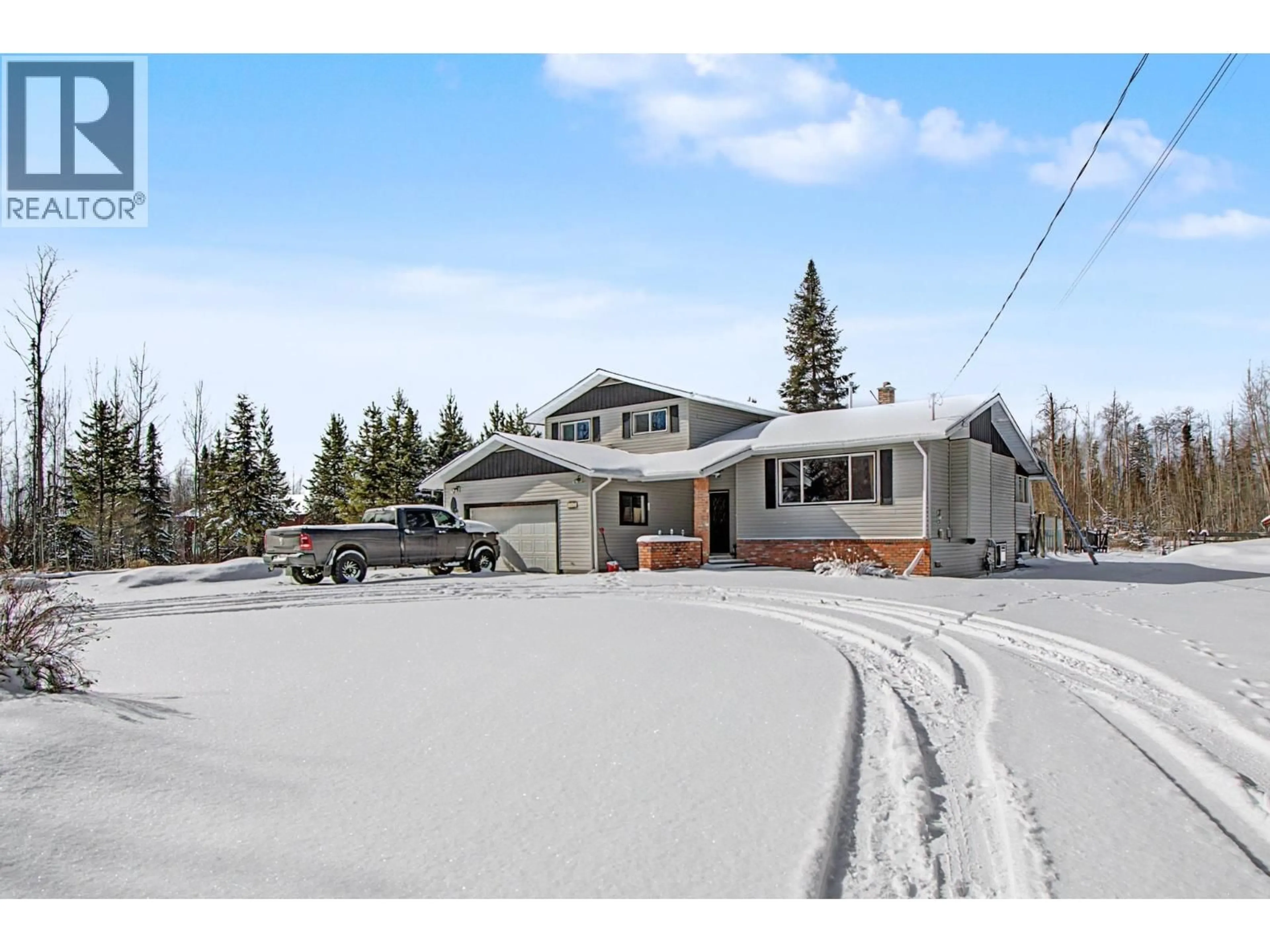 A pic from outside/outdoor area/front of a property/back of a property/a pic from drone, street for 7245 PARSNIP ROAD, Prince George British Columbia V2N6E8