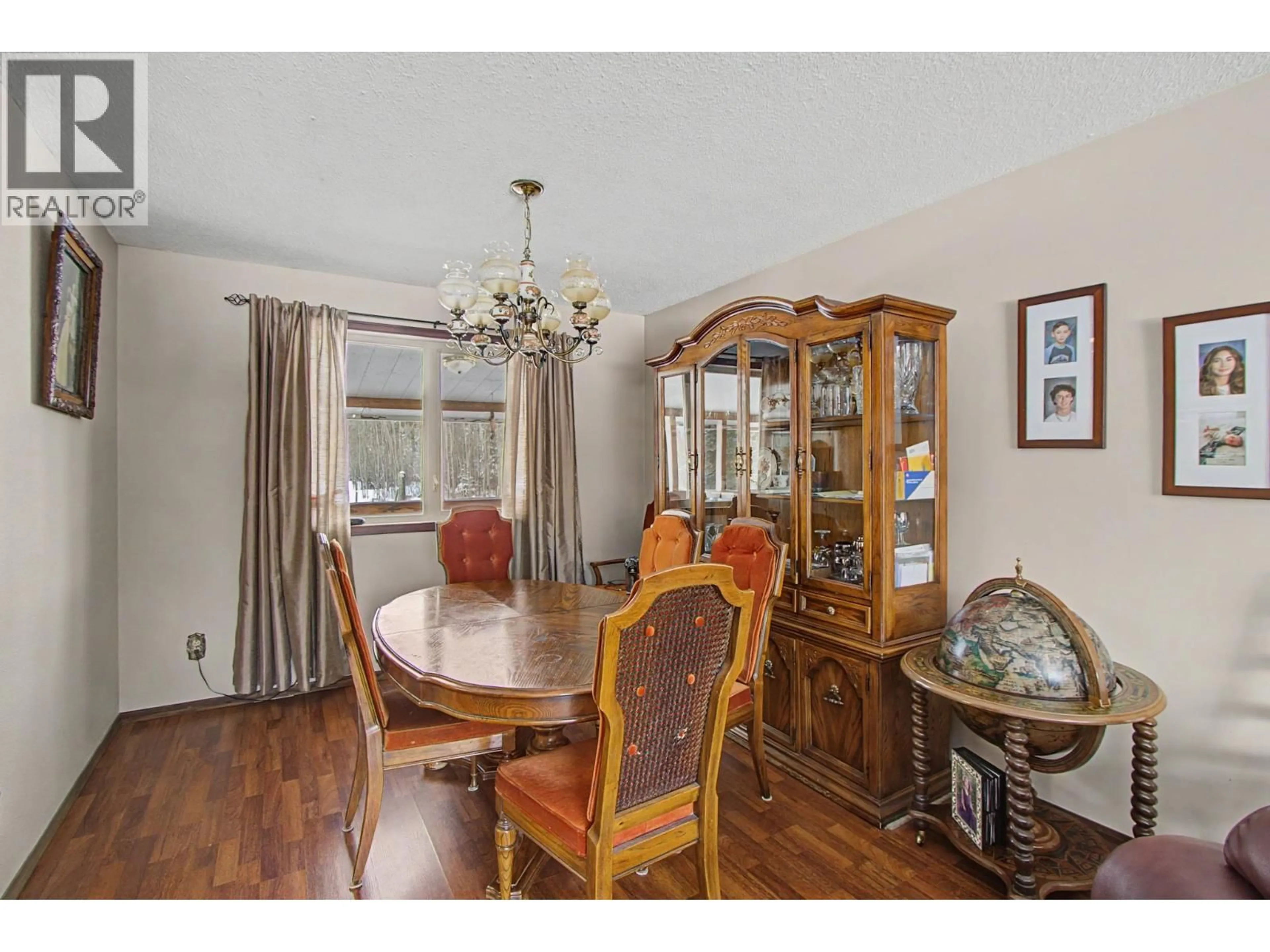 Dining room, wood/laminate floor for 7245 PARSNIP ROAD, Prince George British Columbia V2N6E8