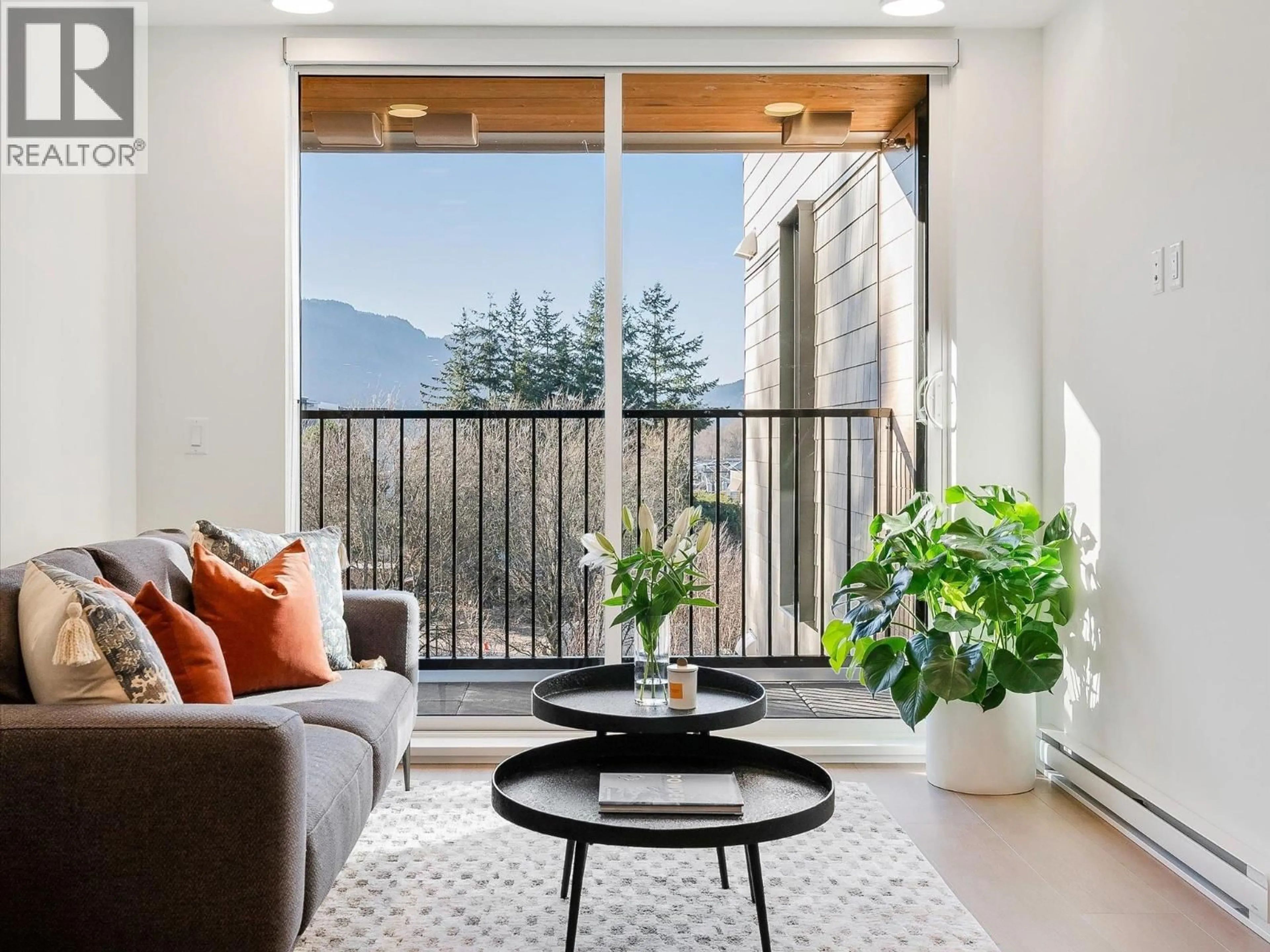 Living room with furniture, unknown for 502 - 37994 SECOND AVENUE, Squamish British Columbia V8B0C3