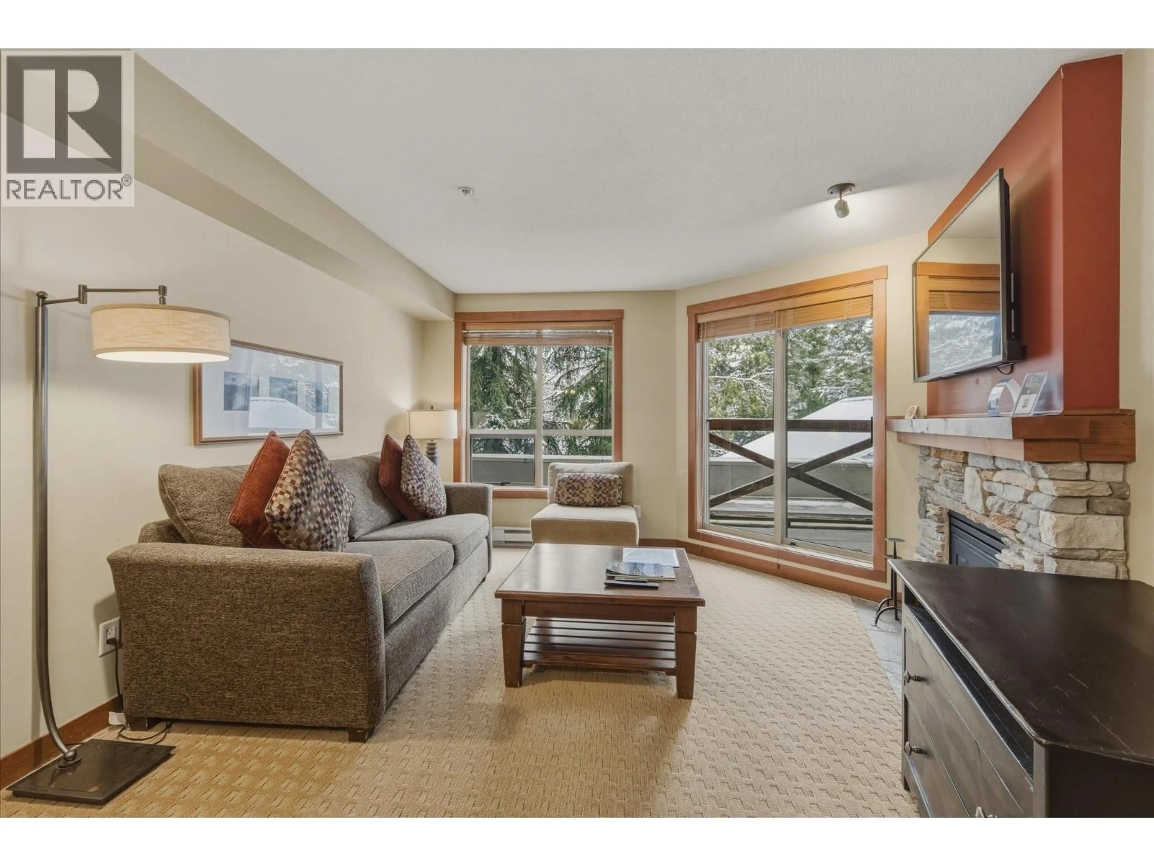 Living room with furniture, unknown for 202(G1) - 4653 BLACKCOMB WAY, Whistler British Columbia V8E0Y9