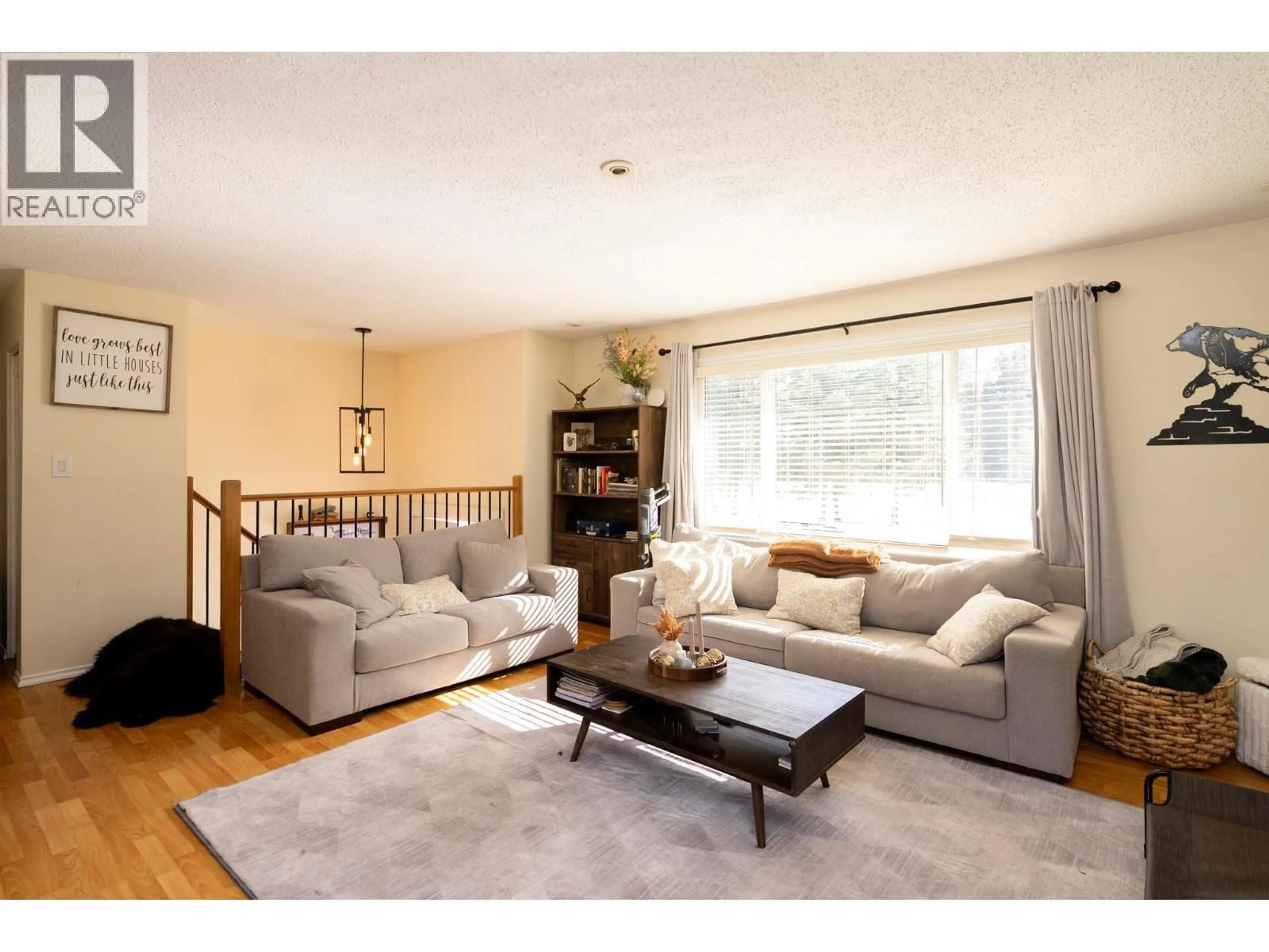 Living room with furniture, wood/laminate floor for 13280 BERGMAN ROAD, Miworth British Columbia V2M7C2