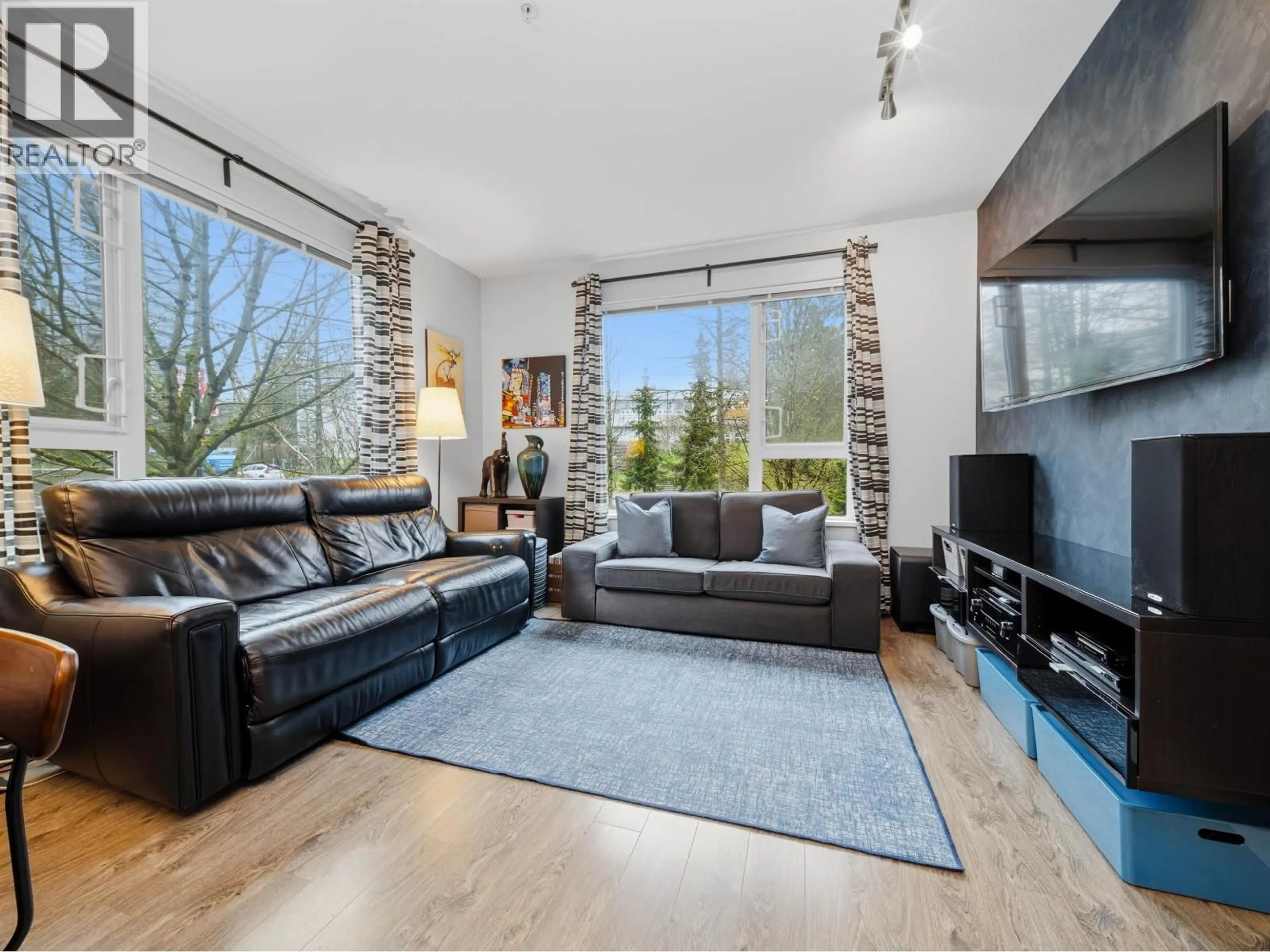 Living room with furniture, unknown for 316 - 9250 UNIVERSITY HIGH STREET, Burnaby British Columbia V5A0B3