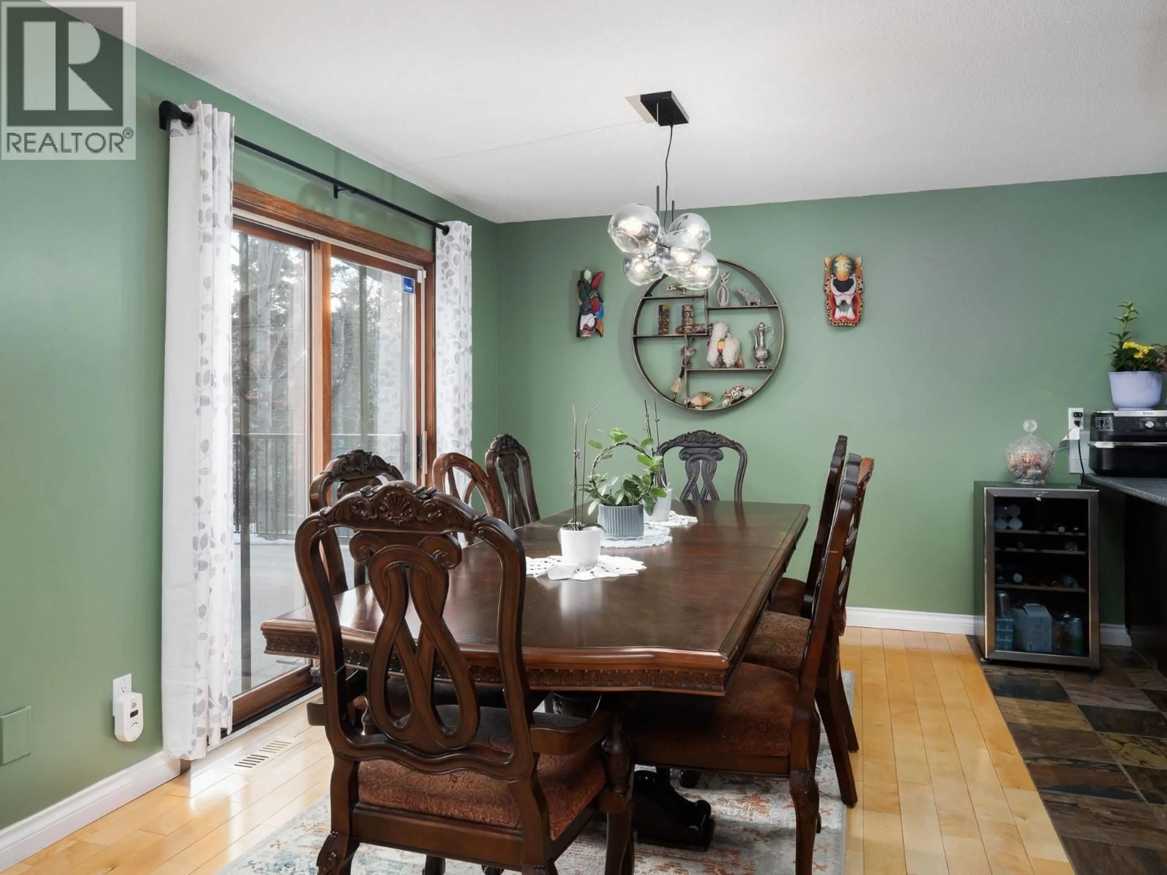 Dining room, wood/laminate floor for 2205 CARLISLE PLACE, Prince George British Columbia V2K4B8