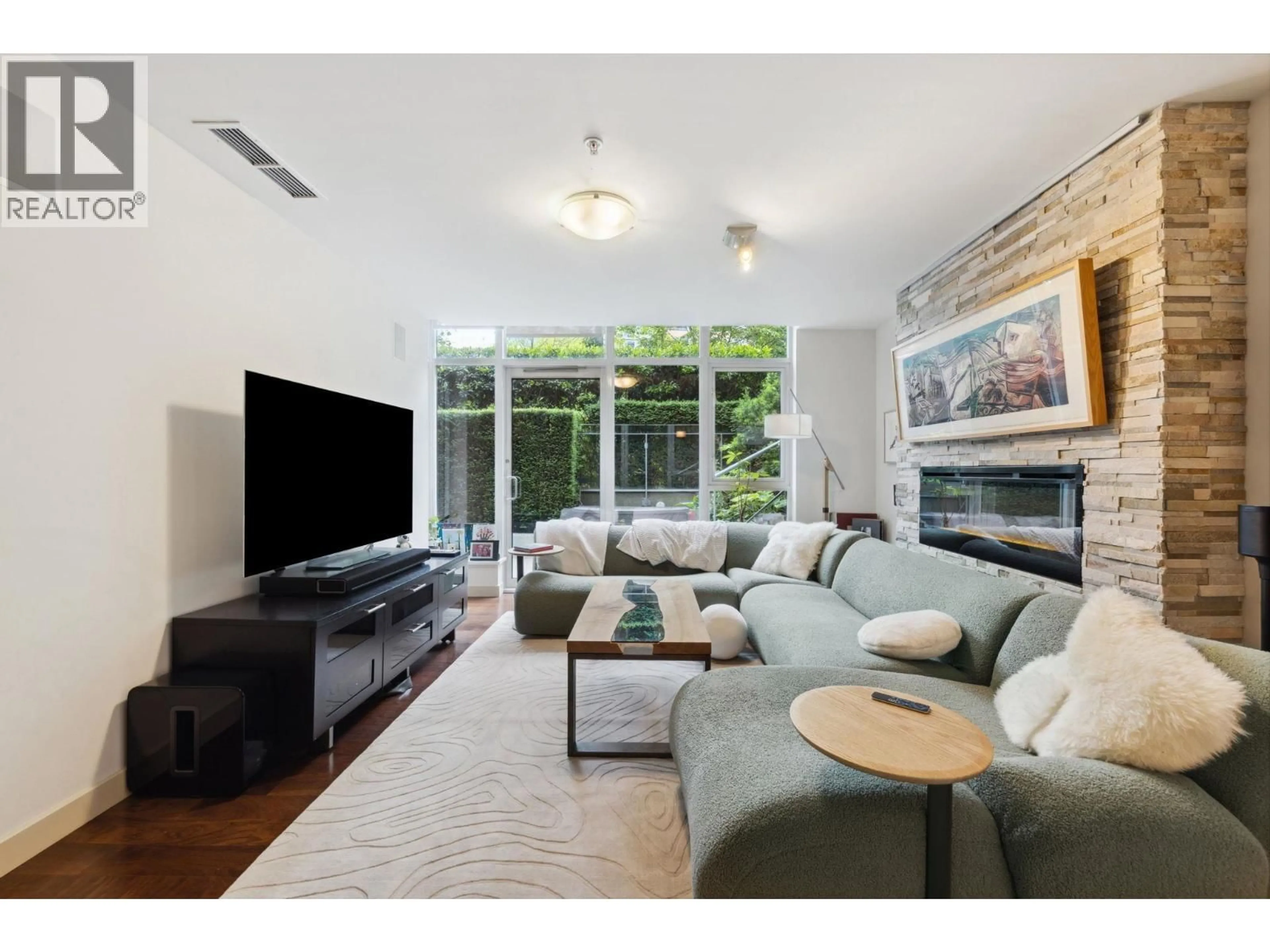 Living room with furniture, unknown for TH12 - 1233 CORDOVA STREET, Vancouver British Columbia V6C3R1