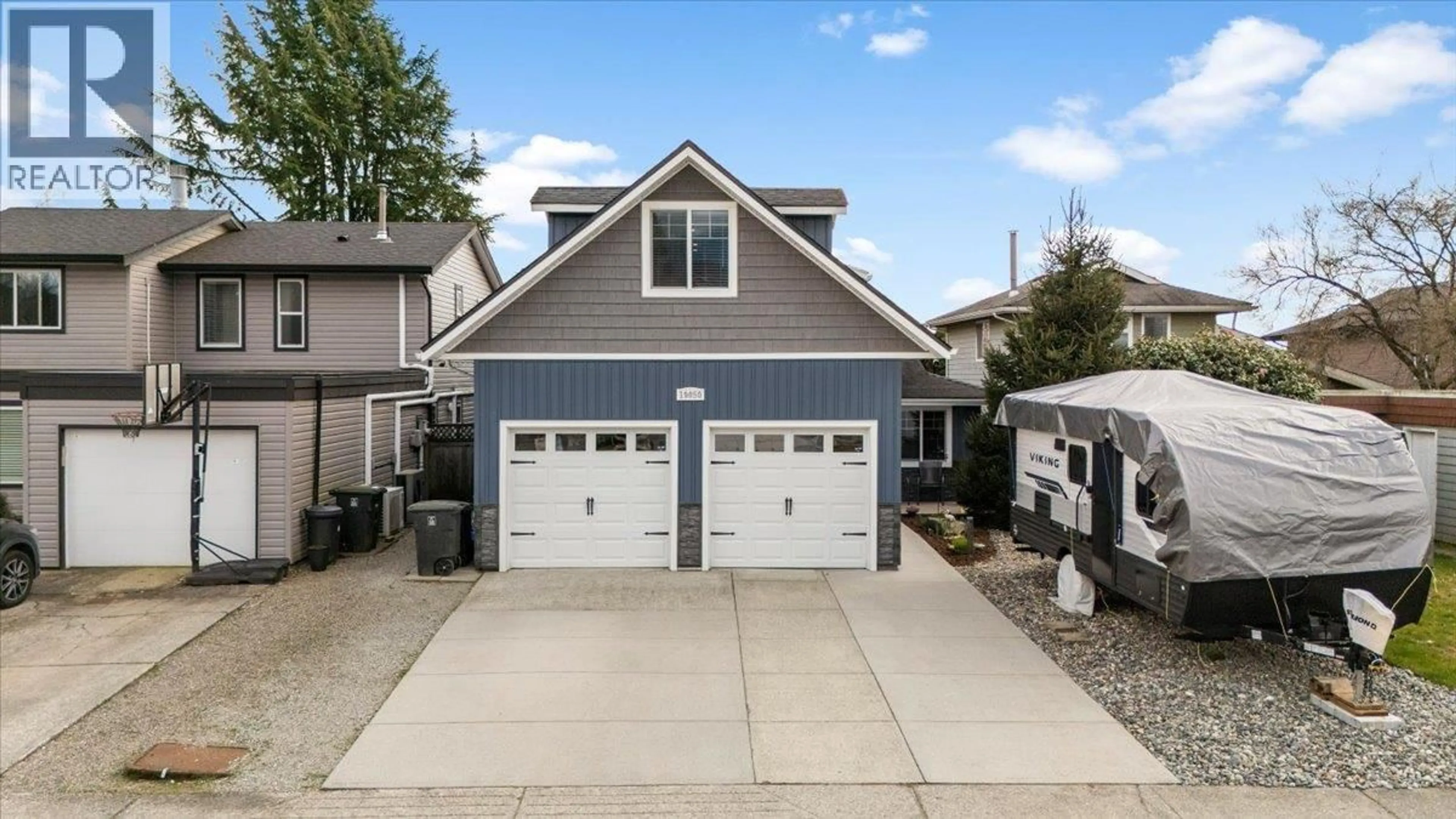 Home with vinyl exterior material, street for 19050 MITCHELL ROAD, Pitt Meadows British Columbia V3Y1X9