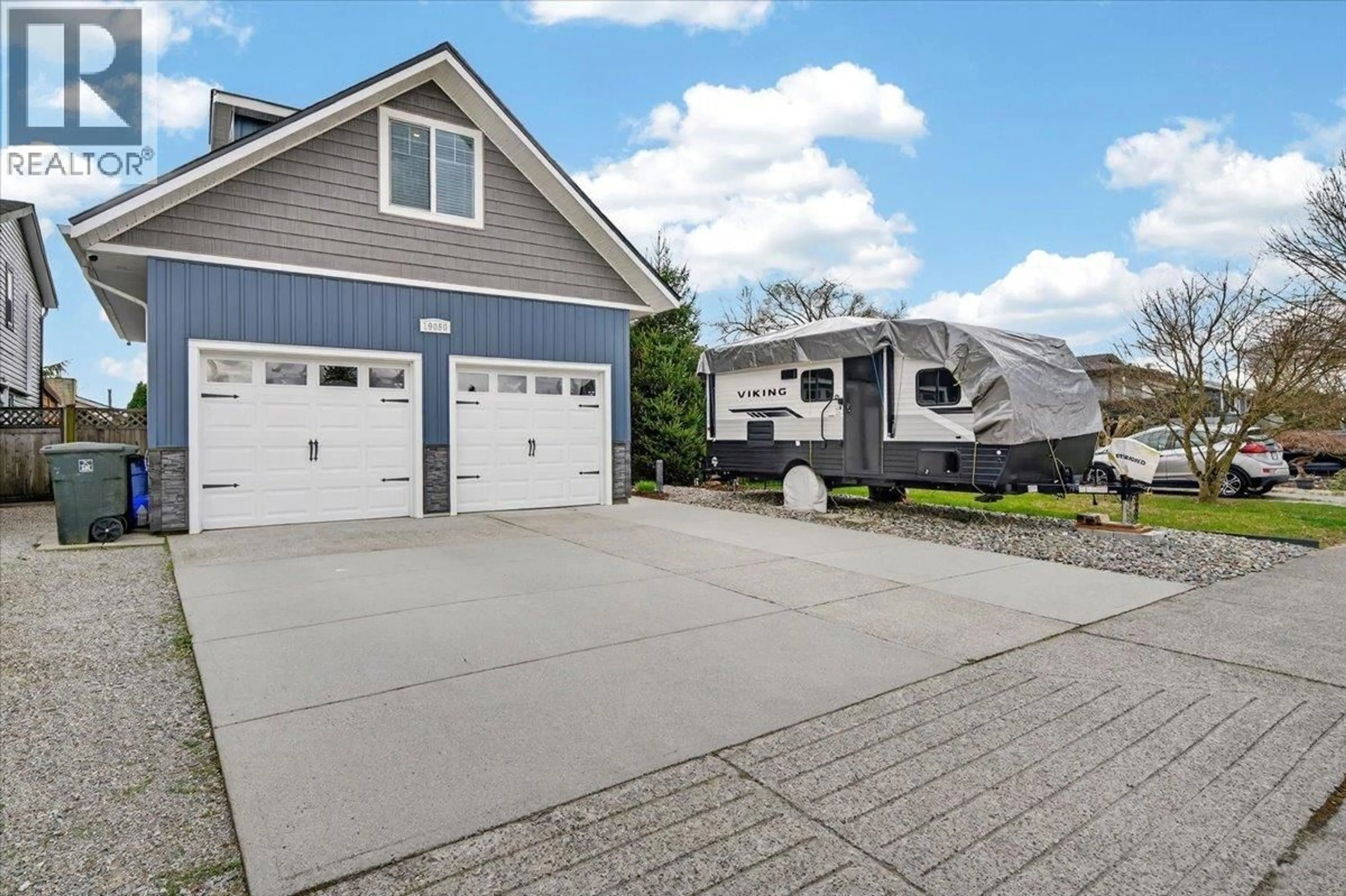 Home with vinyl exterior material, street for 19050 MITCHELL ROAD, Pitt Meadows British Columbia V3Y1X9