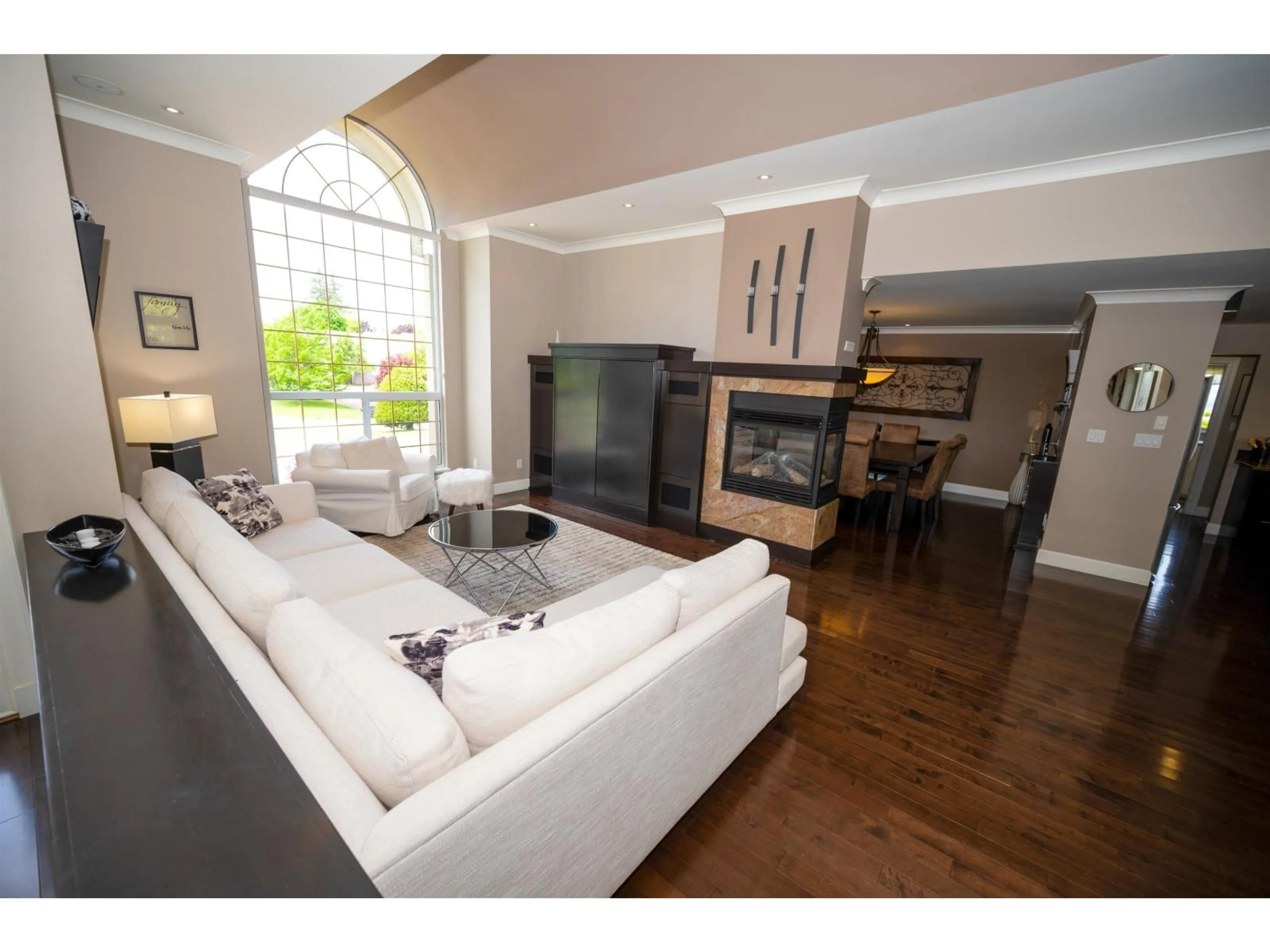 Living room with furniture, wood/laminate floor for 2750 165 STREET, Surrey British Columbia V3Z9X2