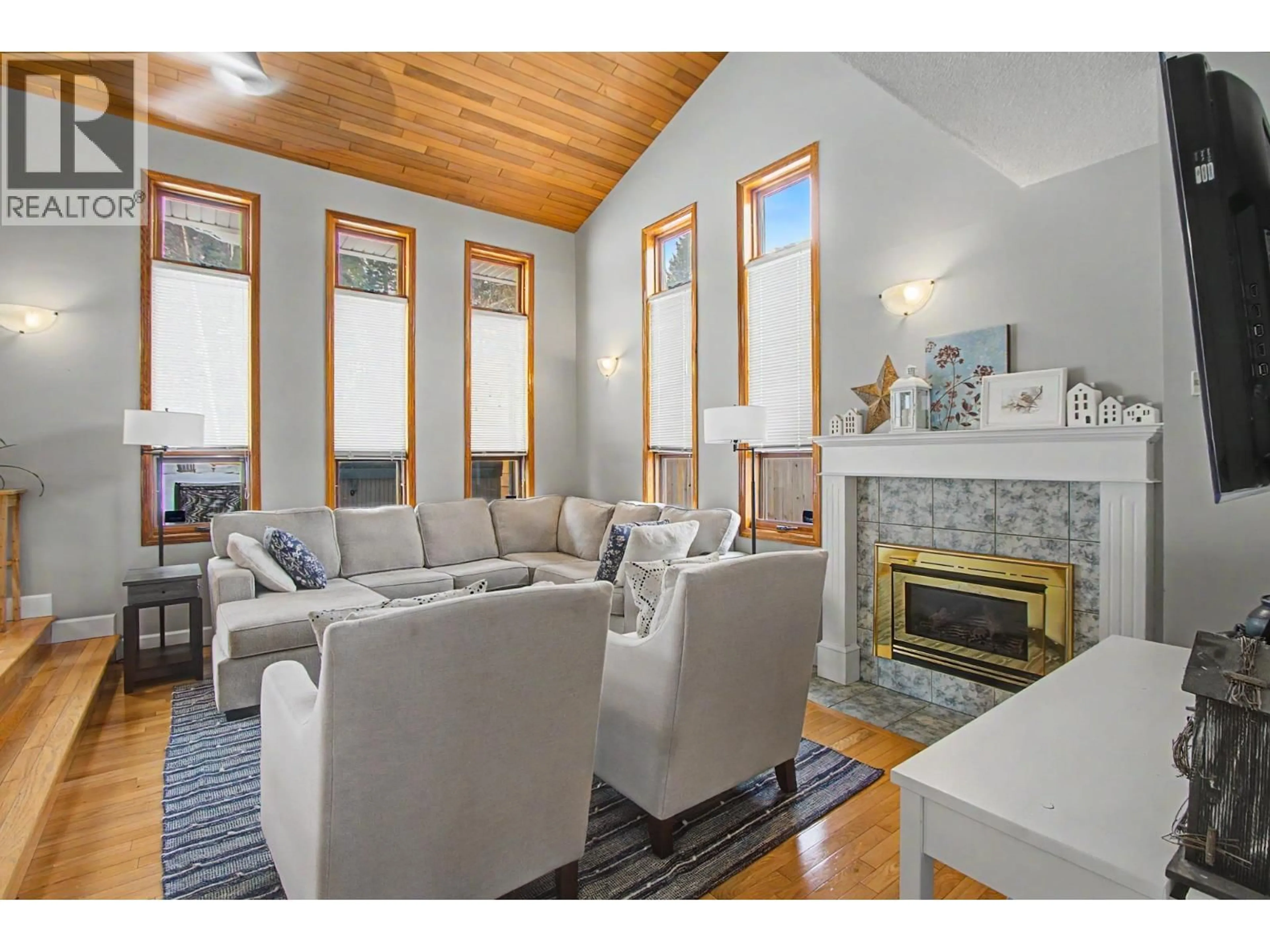 Living room with furniture, wood/laminate floor for 2663 INGALA PLACE, Prince George British Columbia V2K4B7