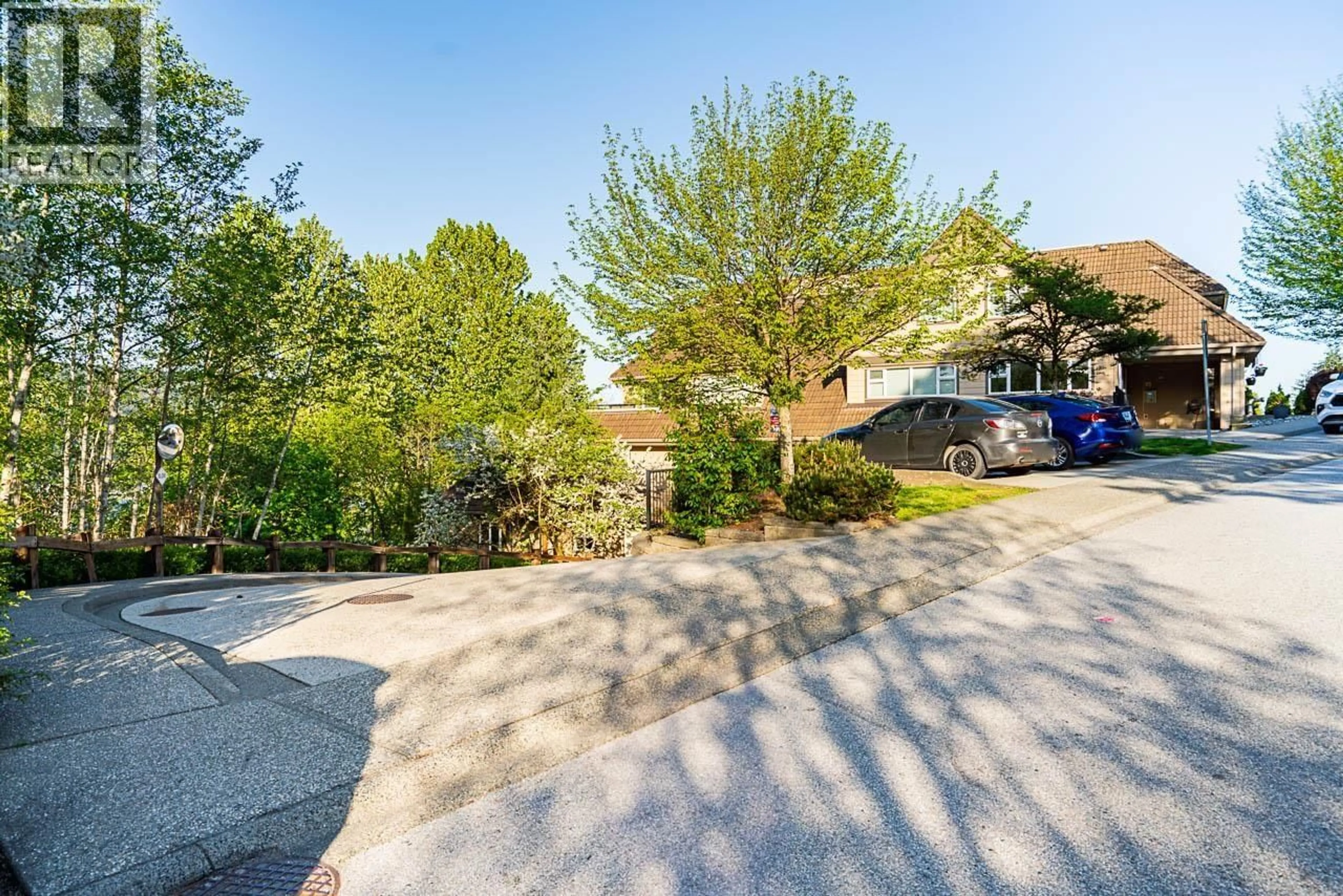 A pic from outside/outdoor area/front of a property/back of a property/a pic from drone, street for 303 - 160 SHORELINE CIRCLE, Port Moody British Columbia V3H0B2