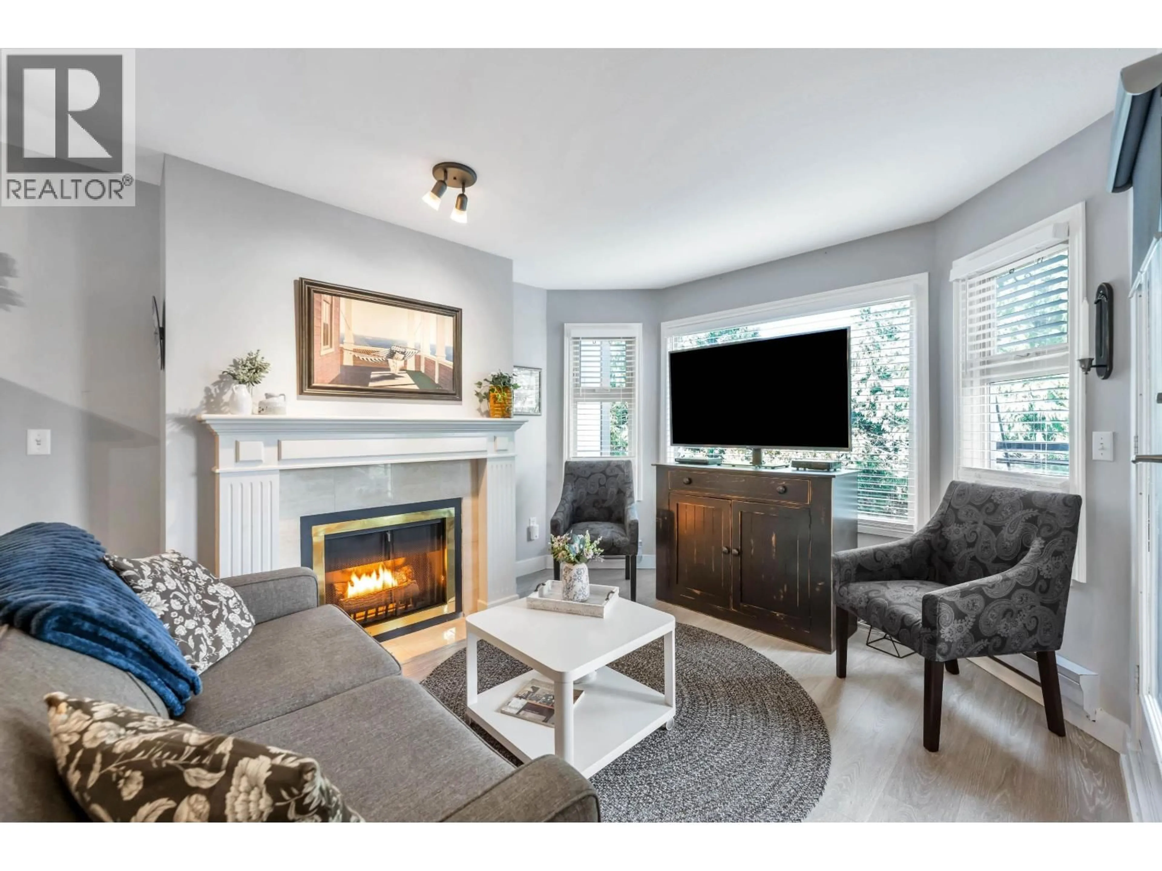 Living room with furniture, unknown for D205 - 4845 53 STREET, Delta British Columbia V4K2Z3