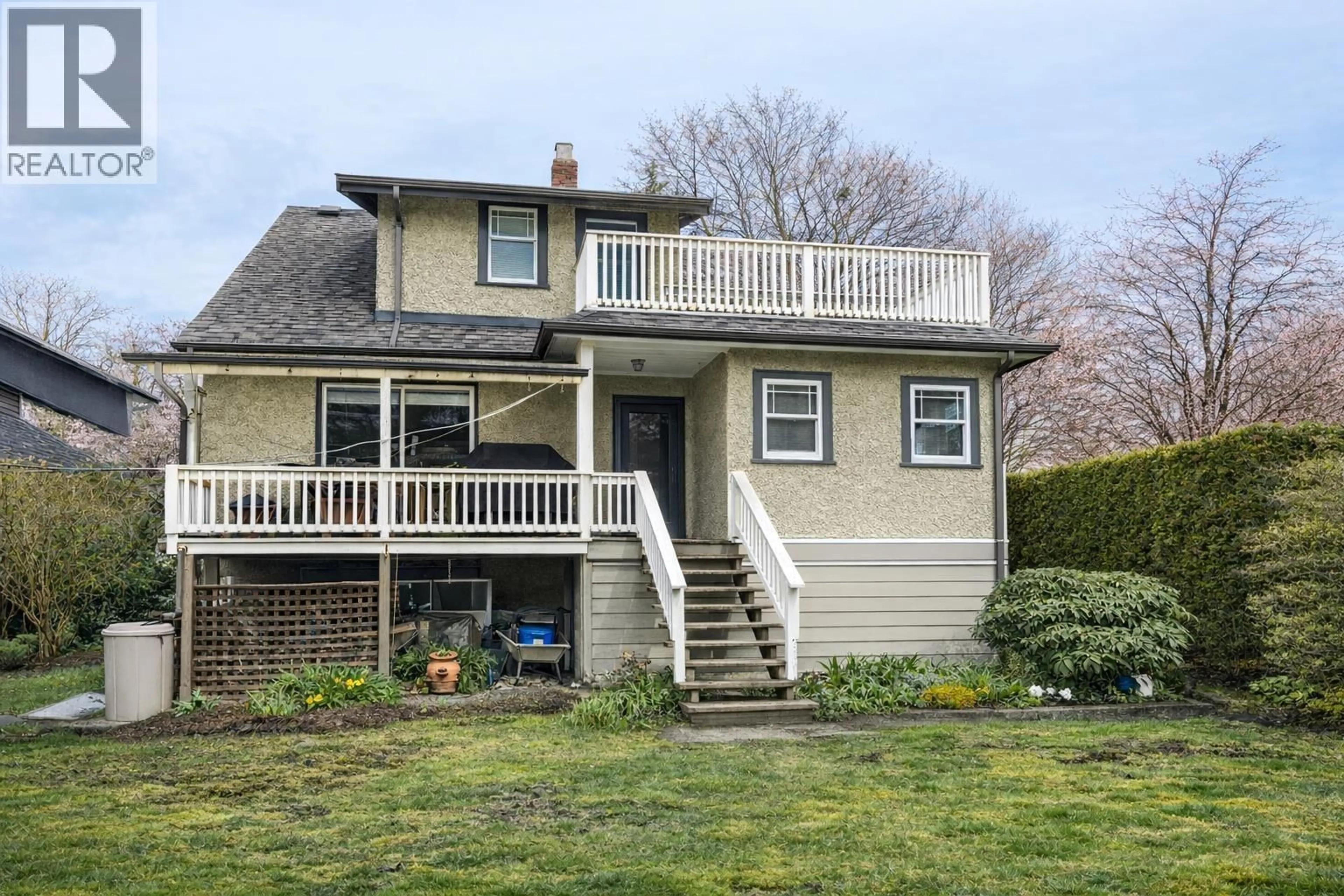 Home with vinyl exterior material, street for 4402 12TH AVENUE, Vancouver British Columbia V6R2R2