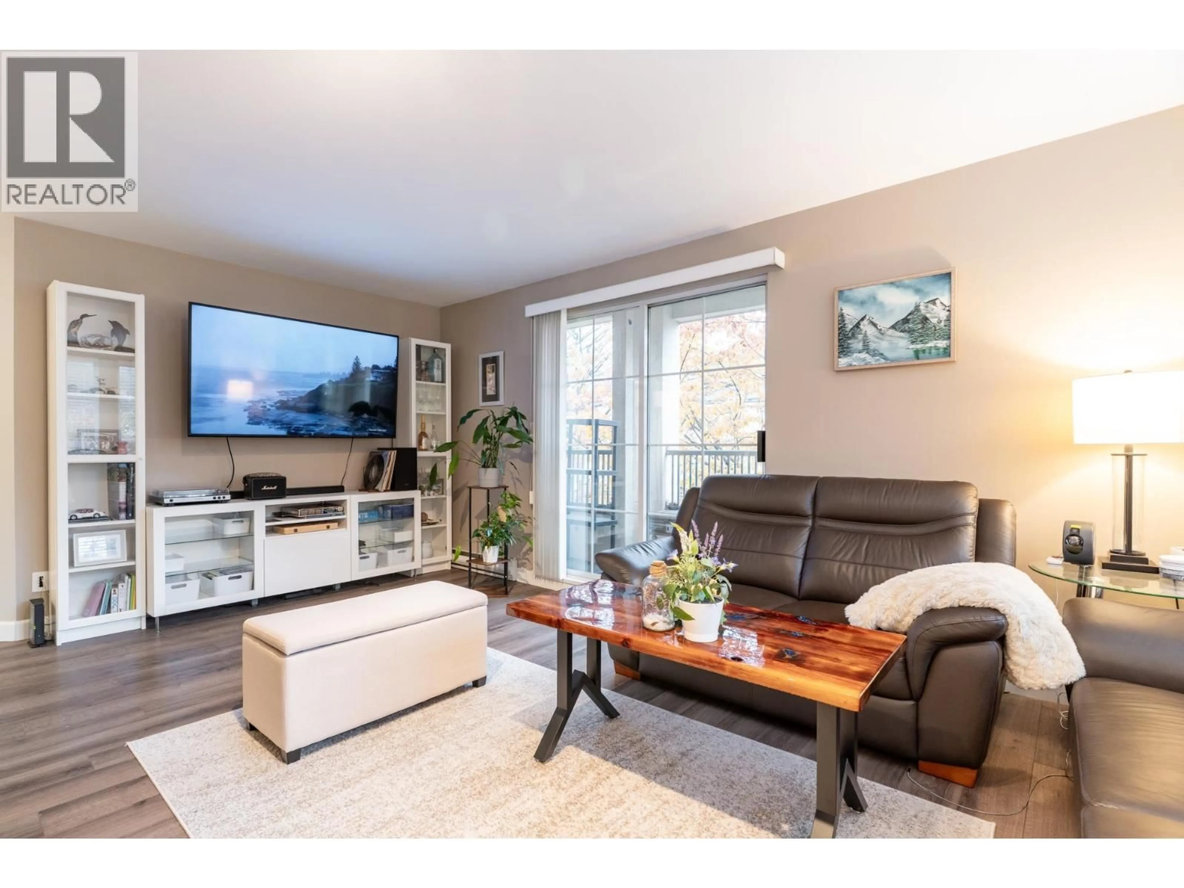 Living room with furniture, wood/laminate floor for 219 - 295 SCHOOLHOUSE STREET, Coquitlam British Columbia V3K6X5