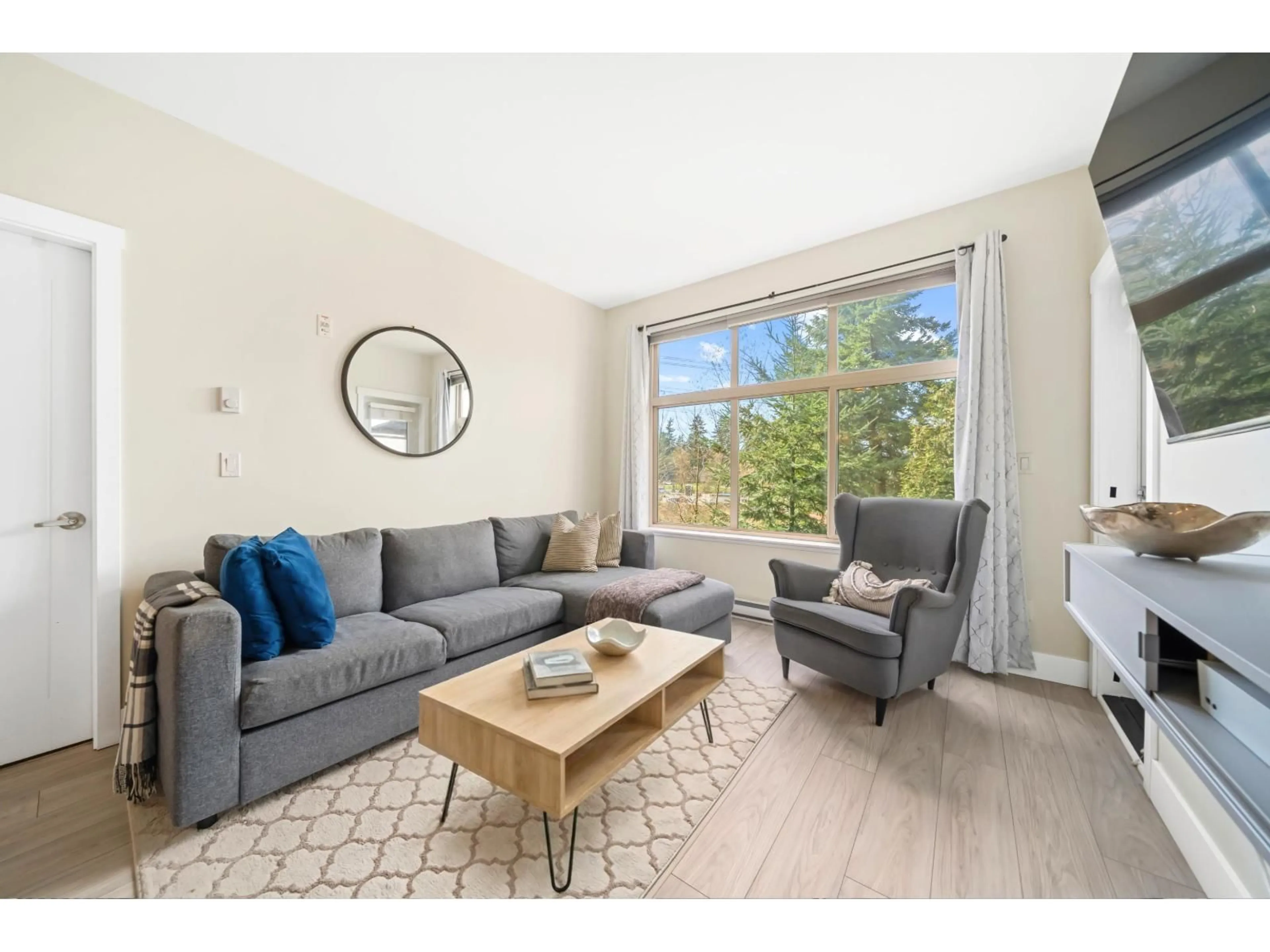 Living room with furniture, wood/laminate floor for 308 - 2855 156 STREET, Surrey British Columbia V3Z3Y3