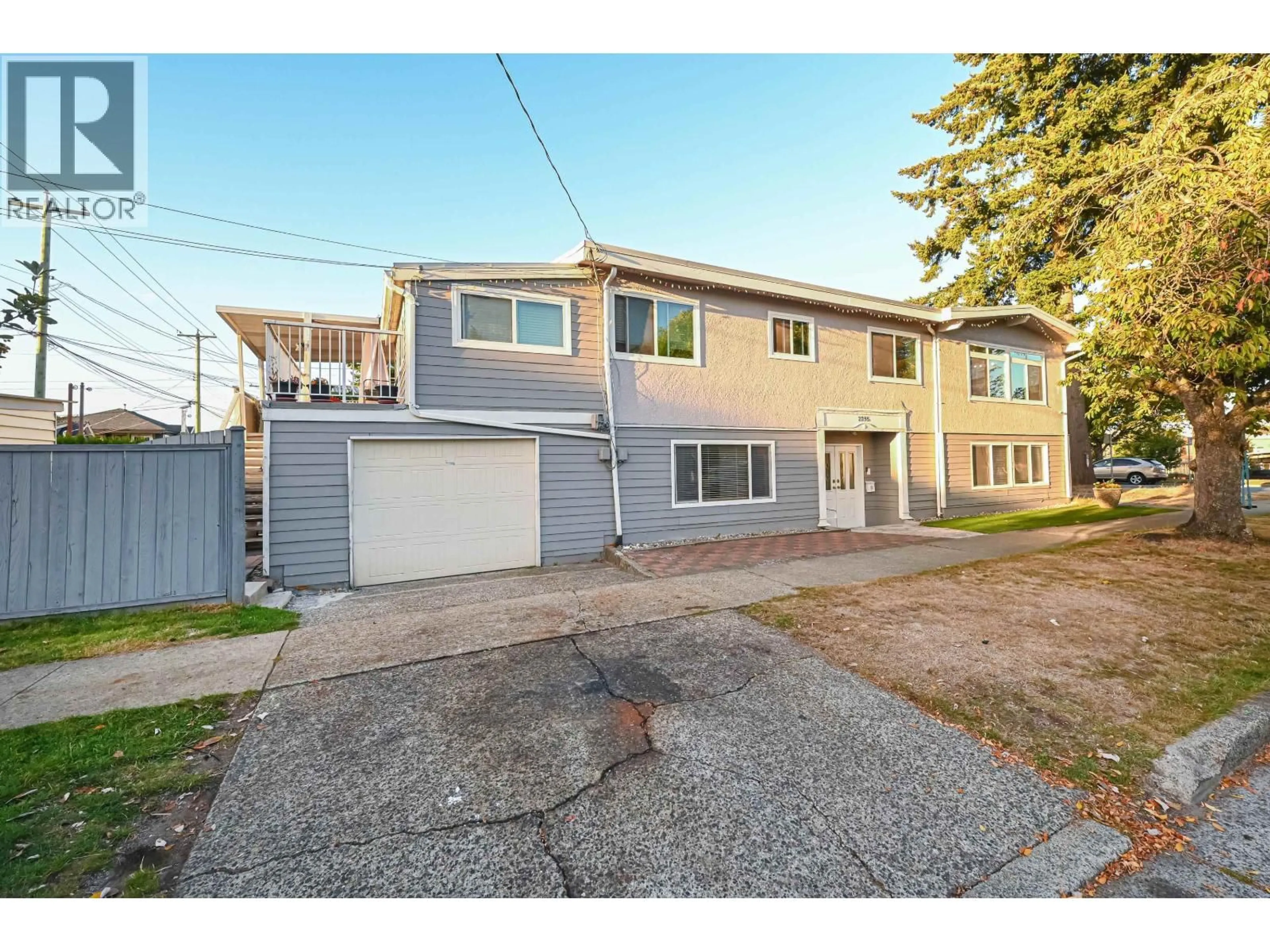 A pic from outside/outdoor area/front of a property/back of a property/a pic from drone, street for 2295 48TH AVENUE, Vancouver British Columbia V5P1R9
