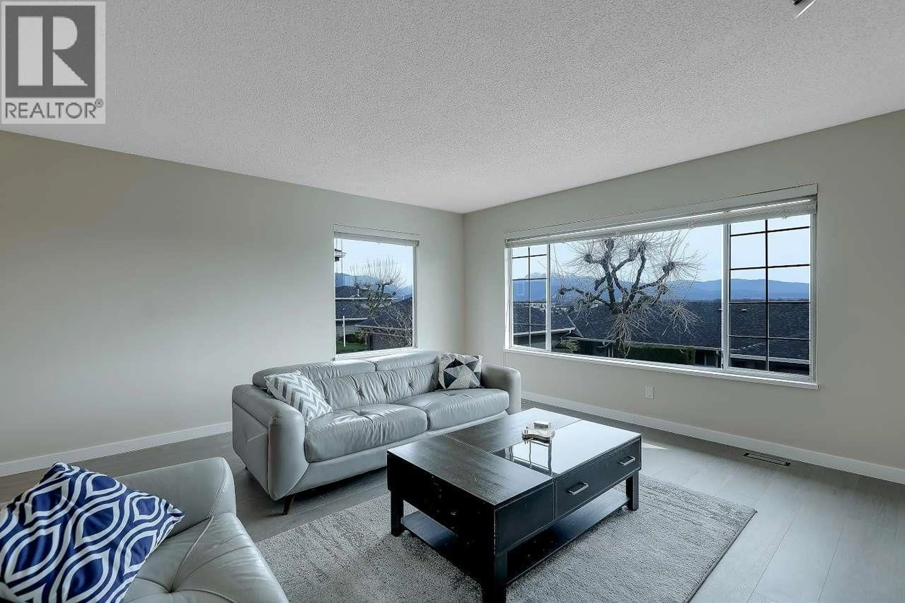 Living room with furniture, unknown for 208 - 1140 CASTLE CRESCENT, Port Coquitlam British Columbia V3C5R6