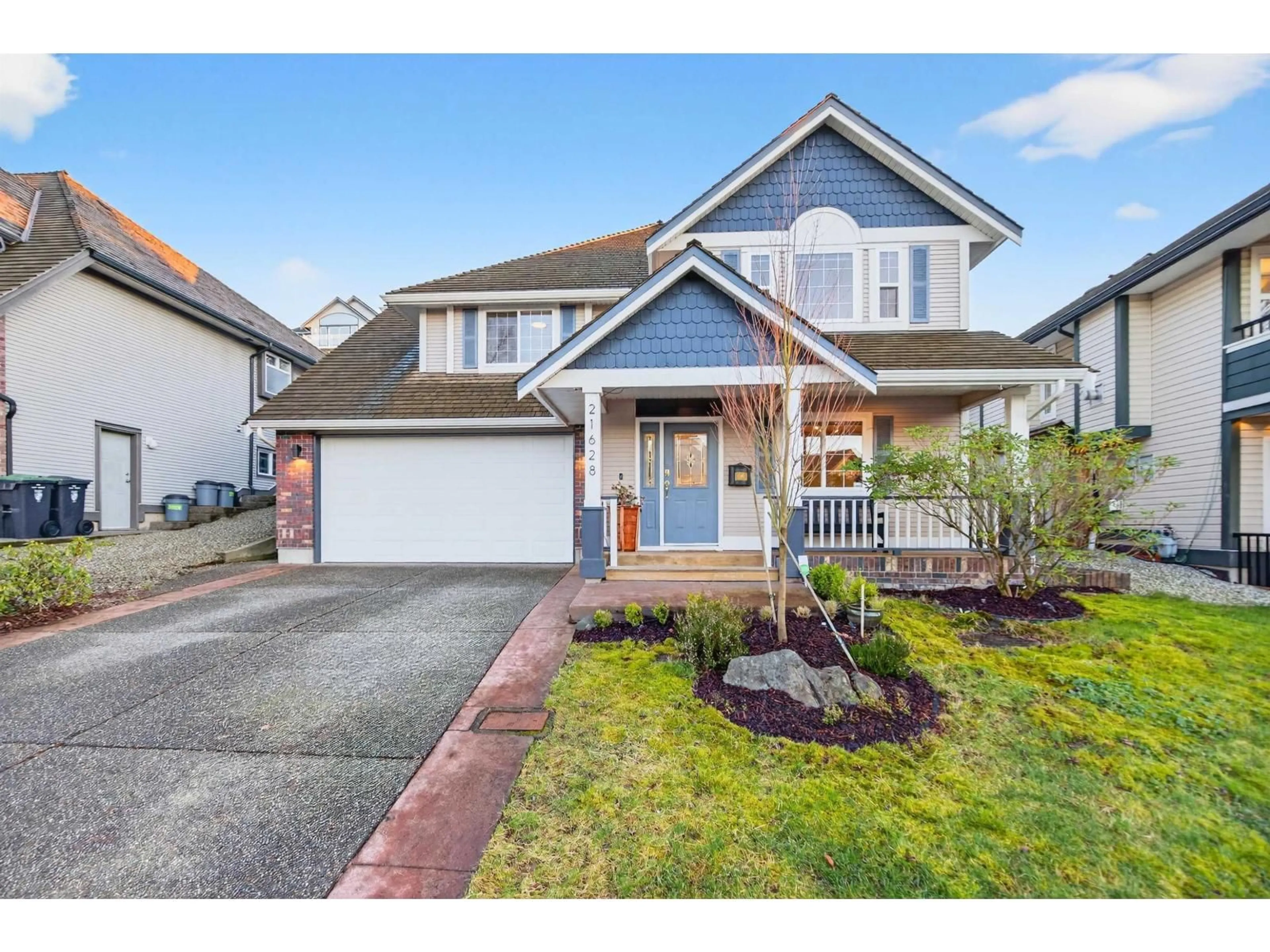 Home with vinyl exterior material, street for 21628 47A AVENUE, Langley British Columbia V3A8S2
