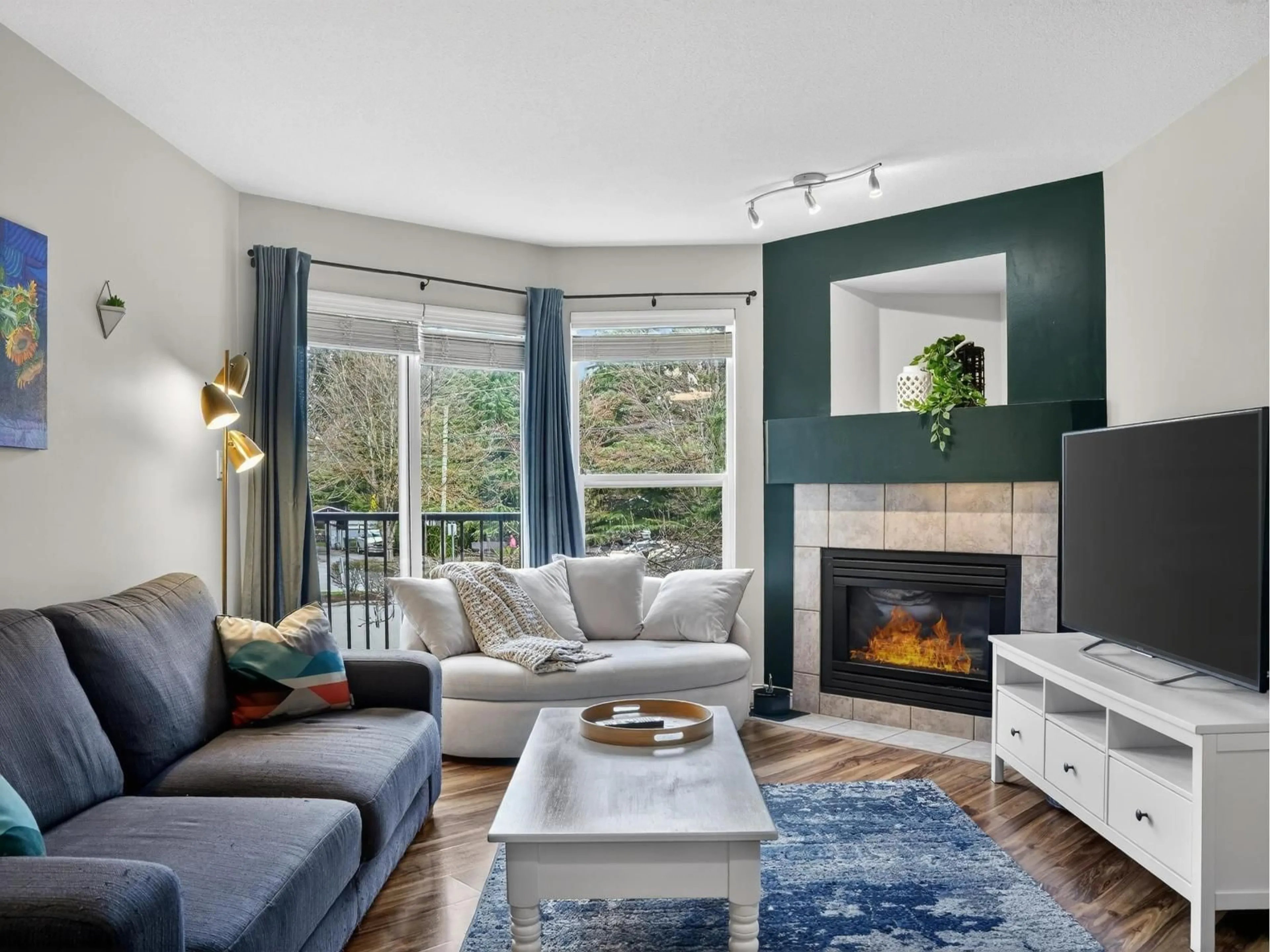 Living room with furniture, unknown for 211 - 33480 GEORGE FERGUSON WAY, Abbotsford British Columbia V2S8G1