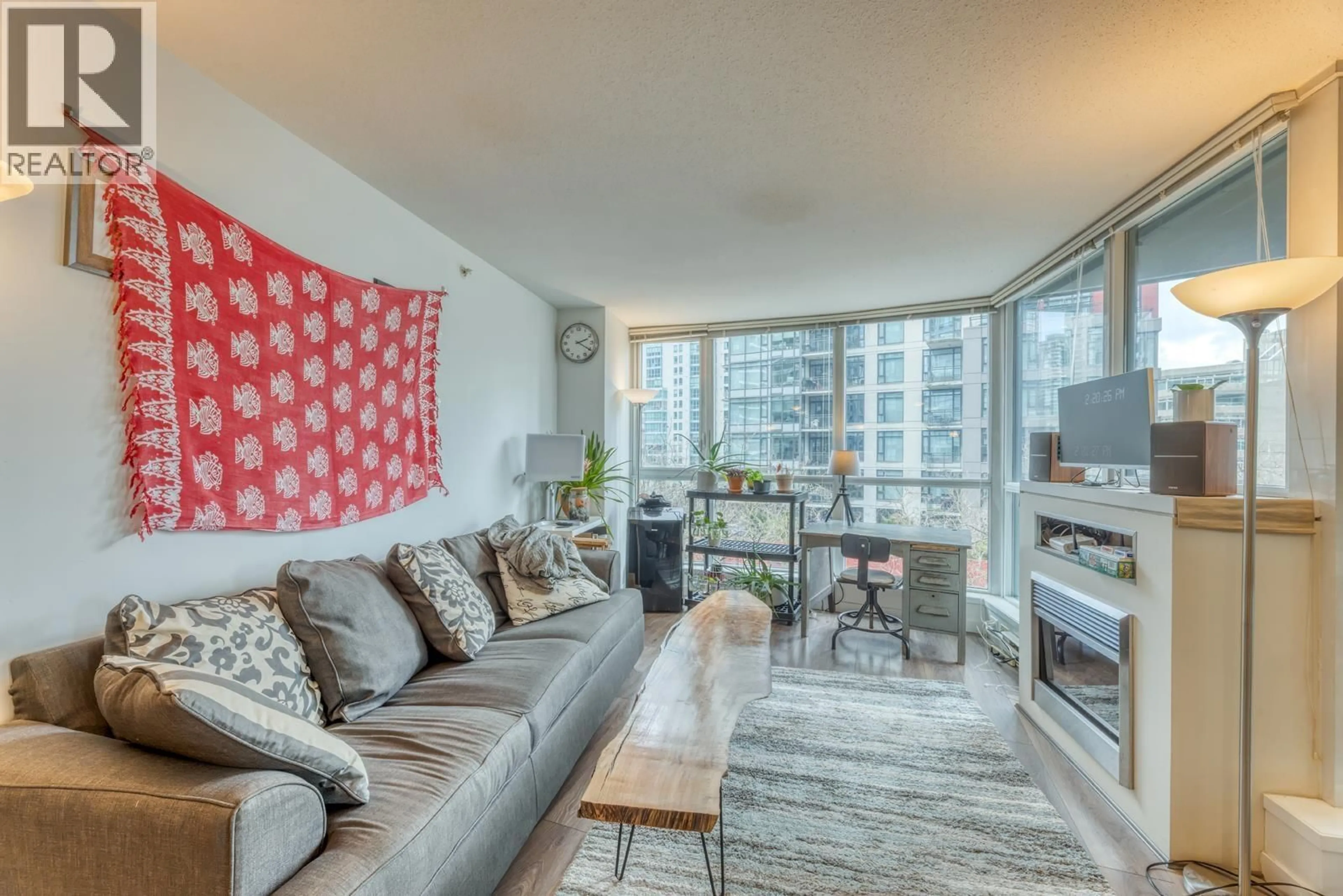 Living room with furniture, unknown for 501 - 1189 MELVILLE STREET, Vancouver British Columbia V6E4T8