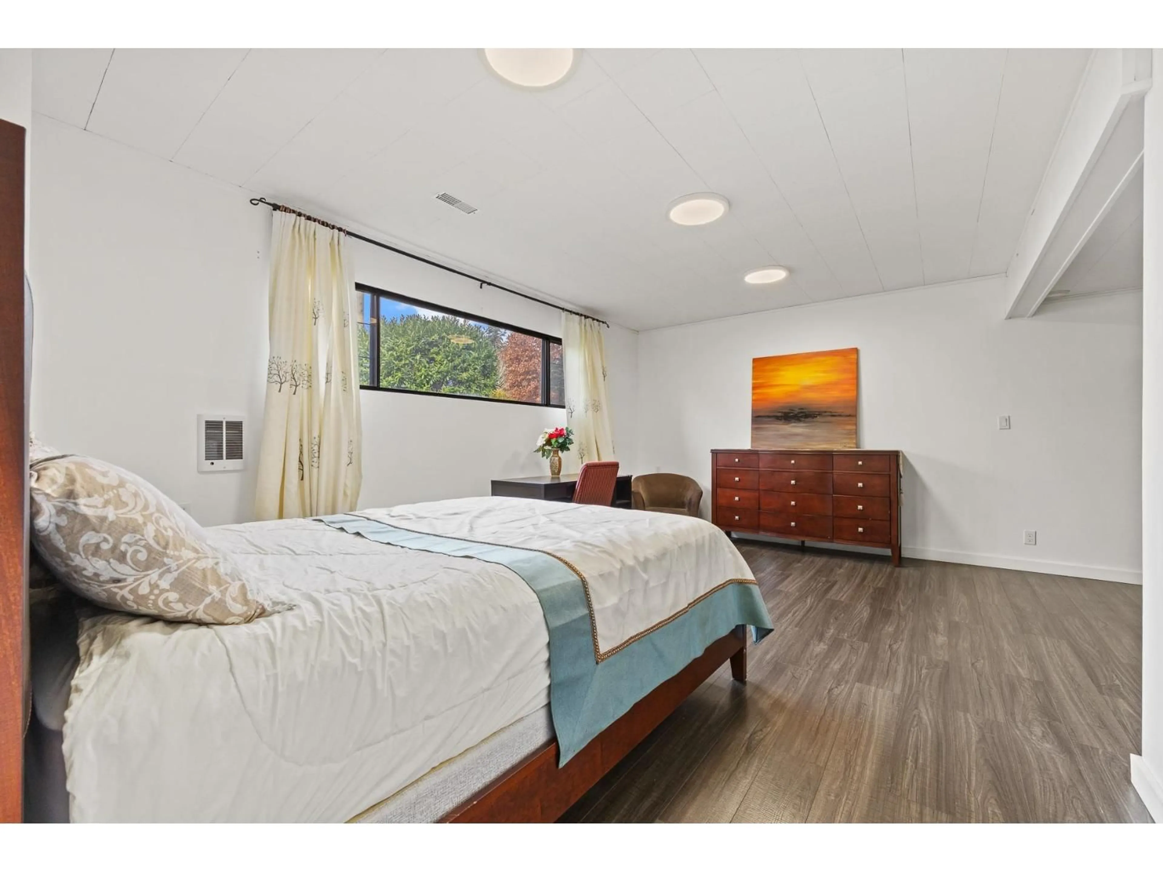 Bedroom with bed, wood/laminate floor for 16730 26 AVENUE, Surrey British Columbia V3Z0B2