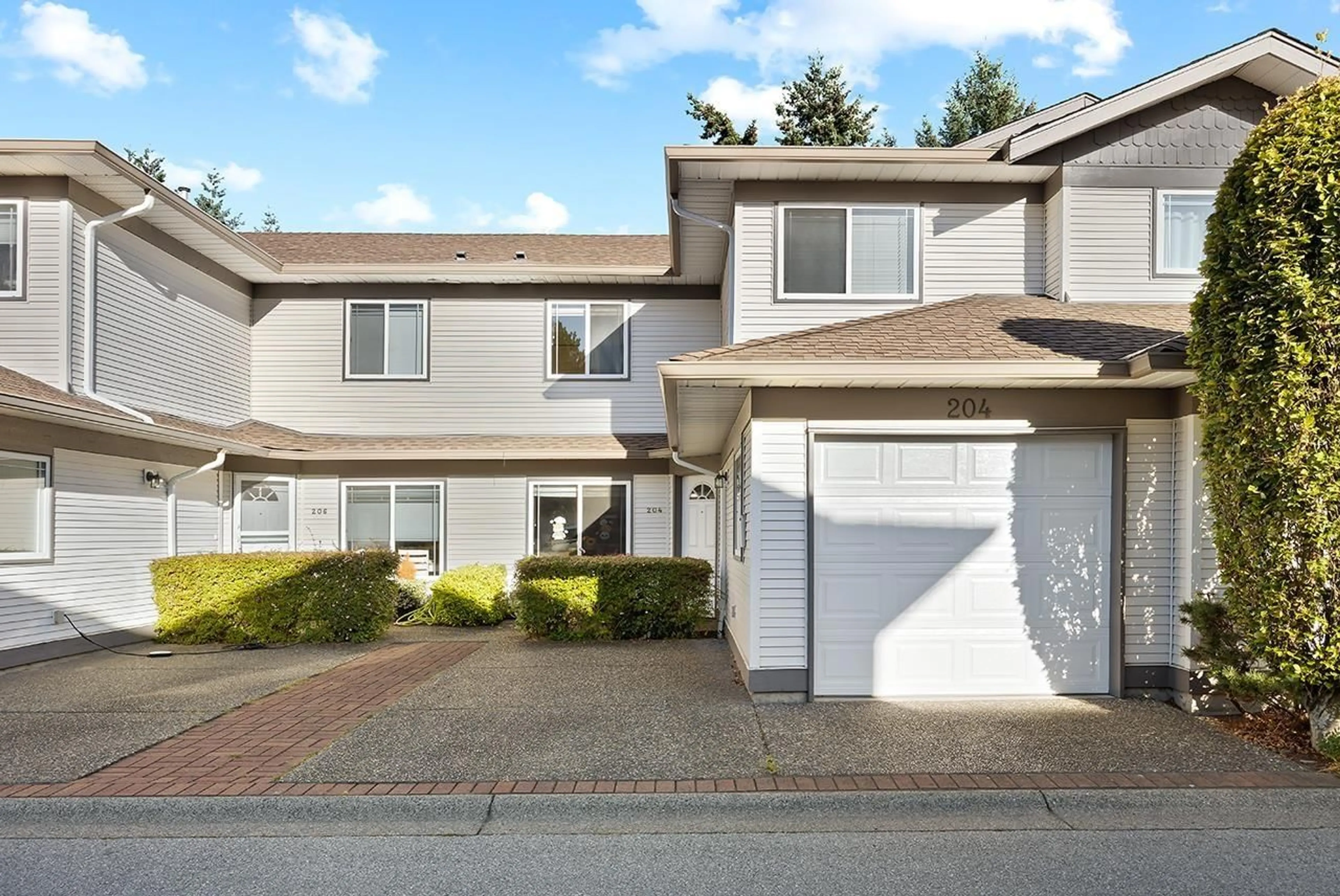 Home with vinyl exterior material, street for 204 - 16233 82 AVENUE, Surrey British Columbia V4N0P7