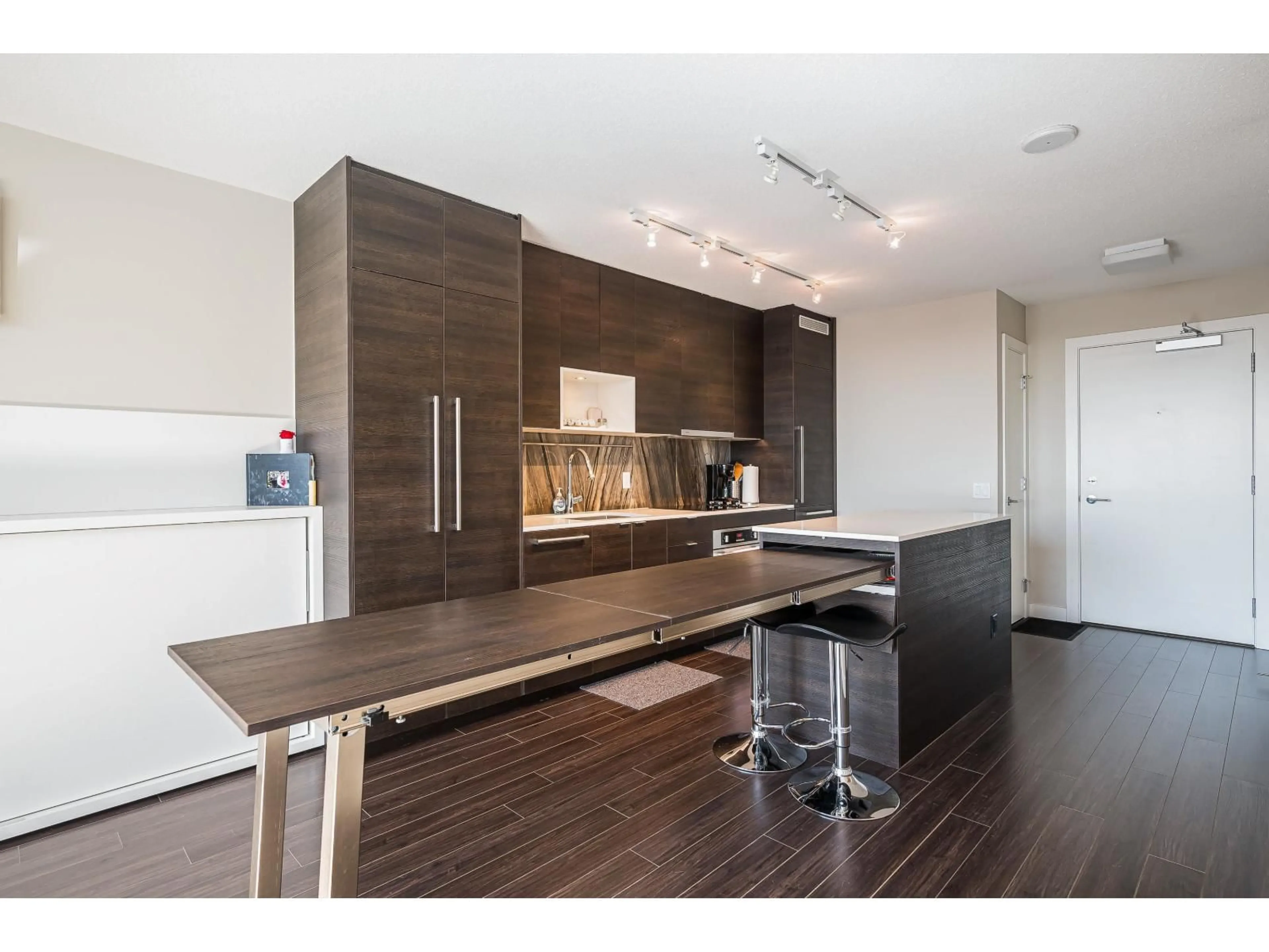 Open concept kitchen, wood/laminate floor for 1609 - 13398 104 AVENUE, Surrey British Columbia V3T1V6