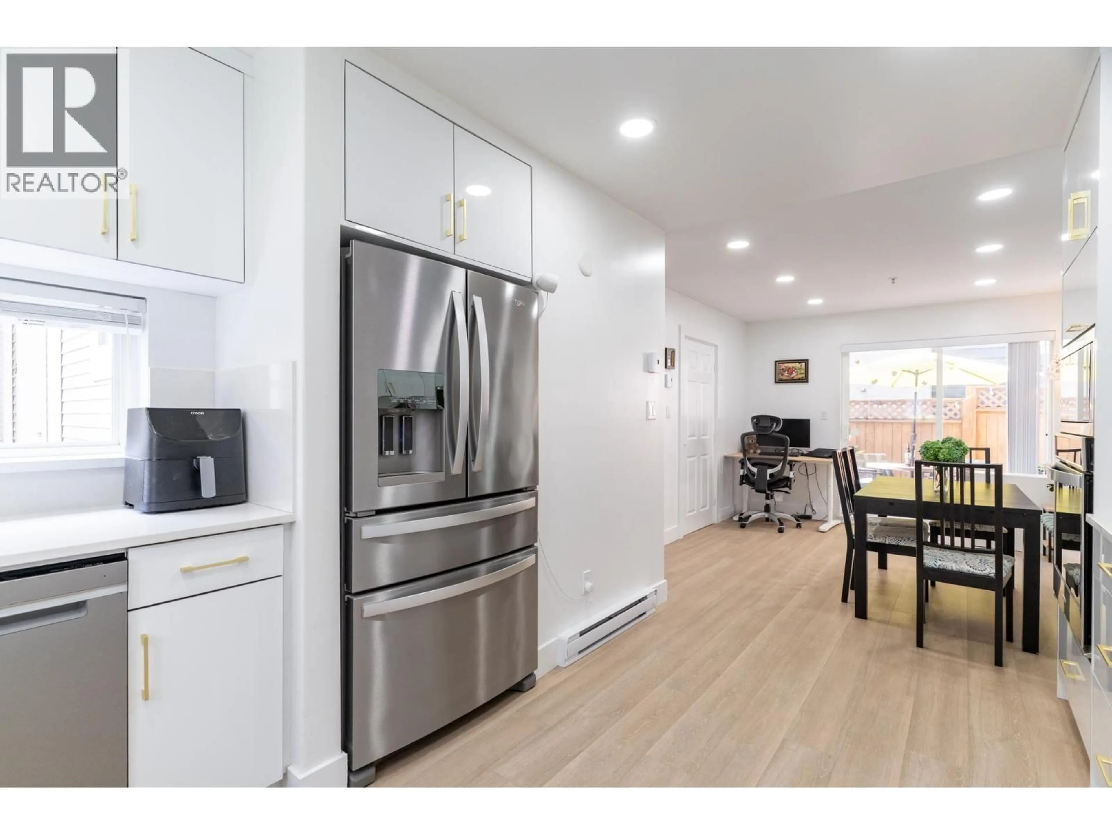 Open concept kitchen, wood/laminate floor for 2 - 1233 16TH STREET, North Vancouver British Columbia V7P1R5