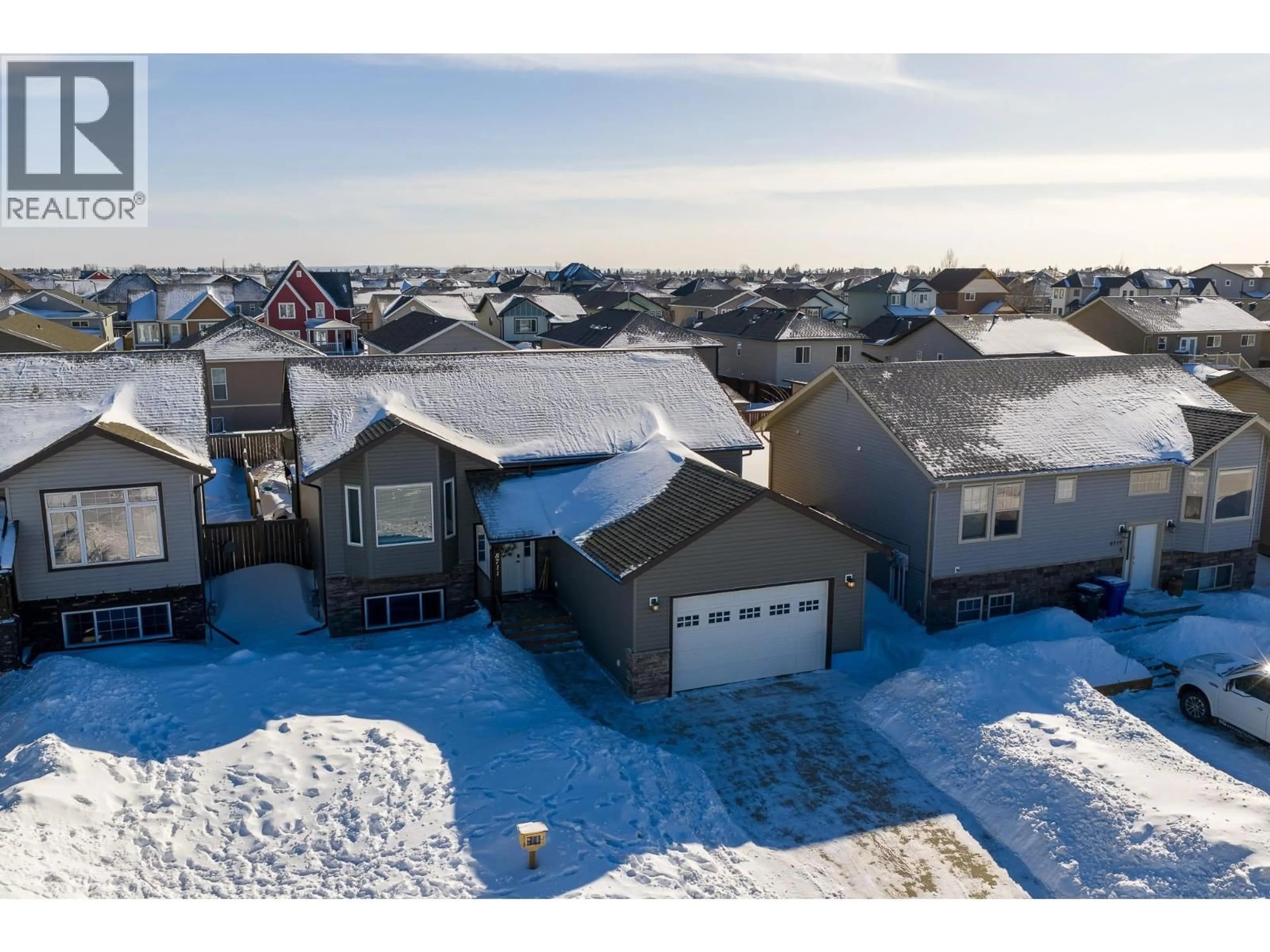 A pic from outside/outdoor area/front of a property/back of a property/a pic from drone, street for 8711 113A AVENUE, Fort St. John British Columbia V1J0C4