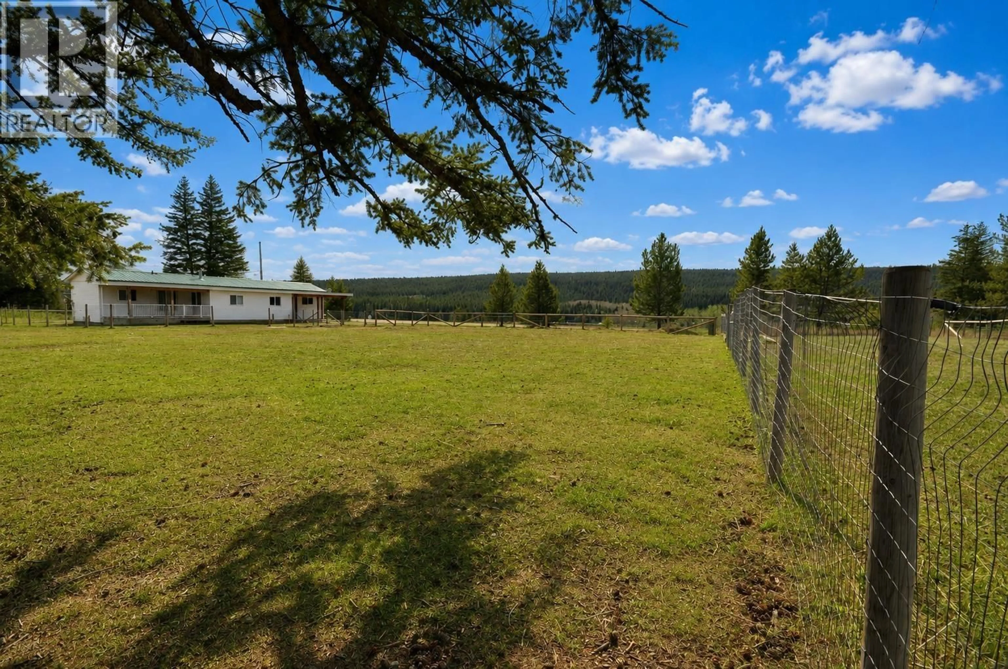 A pic from outside/outdoor area/front of a property/back of a property/a pic from drone, mountain view for 3238 HINSCHE ROAD, 150 Mile House British Columbia V0K2G0