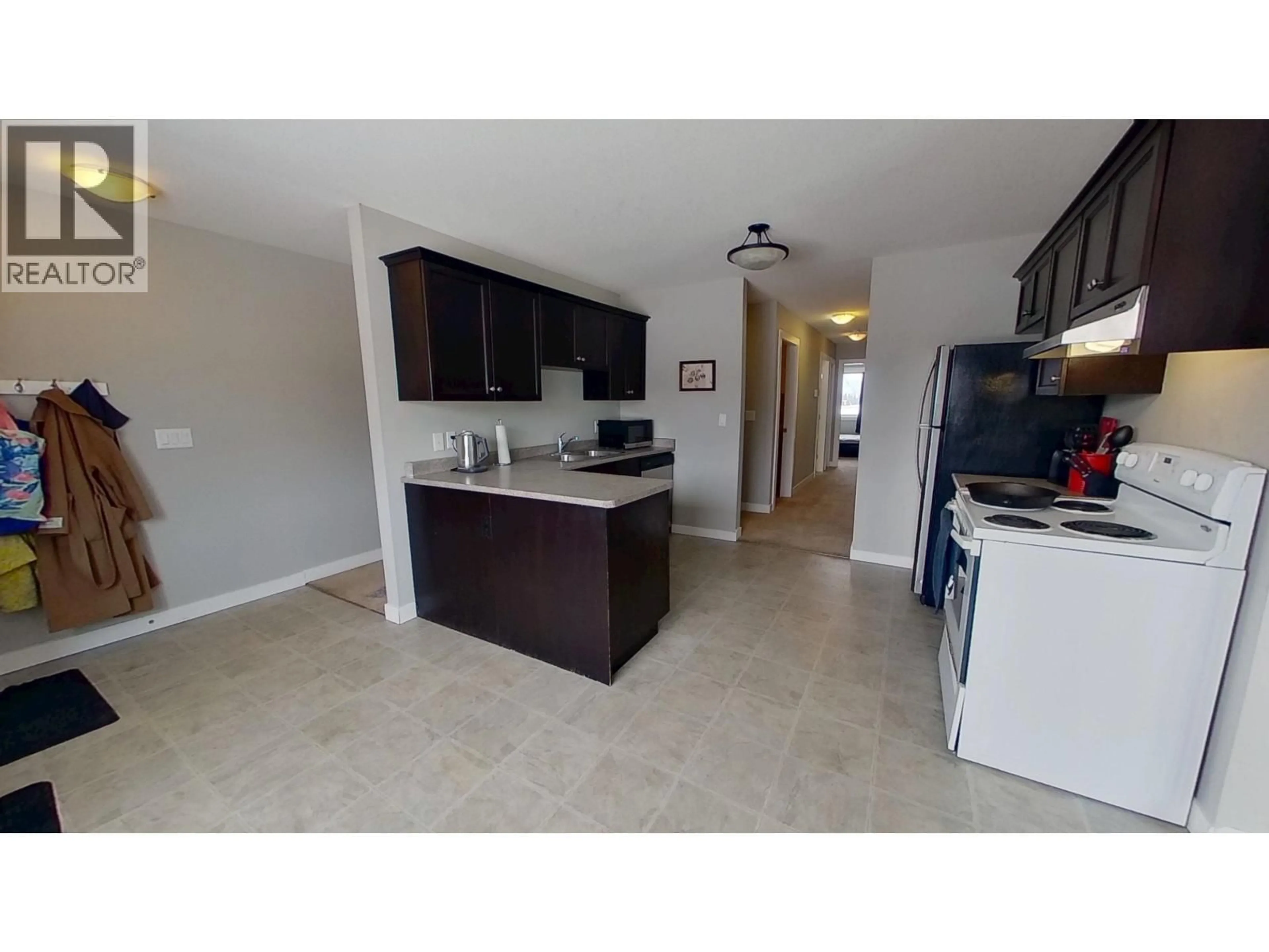 Open concept kitchen, ceramic/tile floor for 9 - 9707 99 AVENUE, Taylor British Columbia V0C2K0