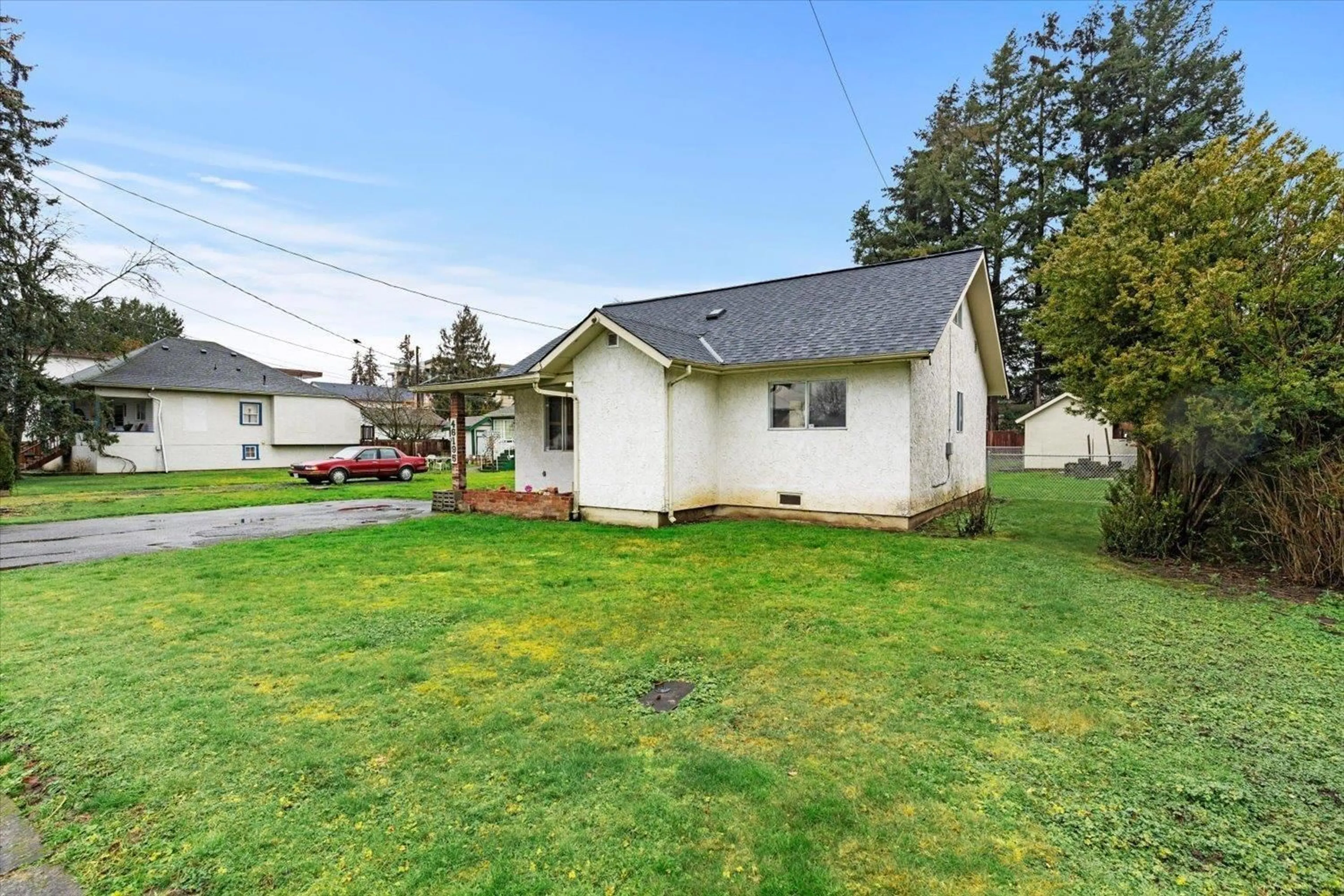 A pic from outside/outdoor area/front of a property/back of a property/a pic from drone, street for 46195 GORE AVENUE, Chilliwack British Columbia V2P1Z9