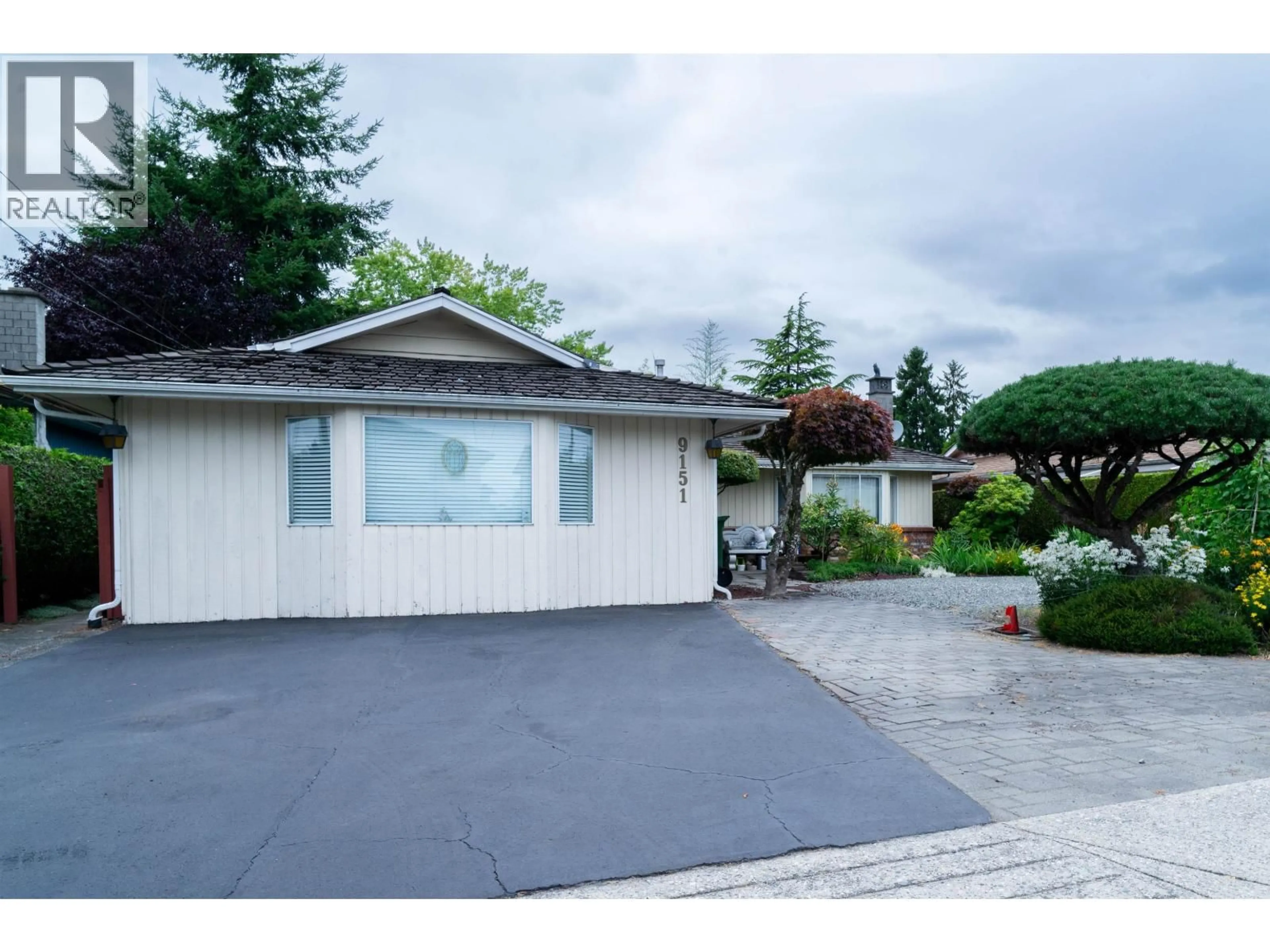 Home with vinyl exterior material, street for 9151 NO. 4 ROAD, Richmond British Columbia V7A2Y8