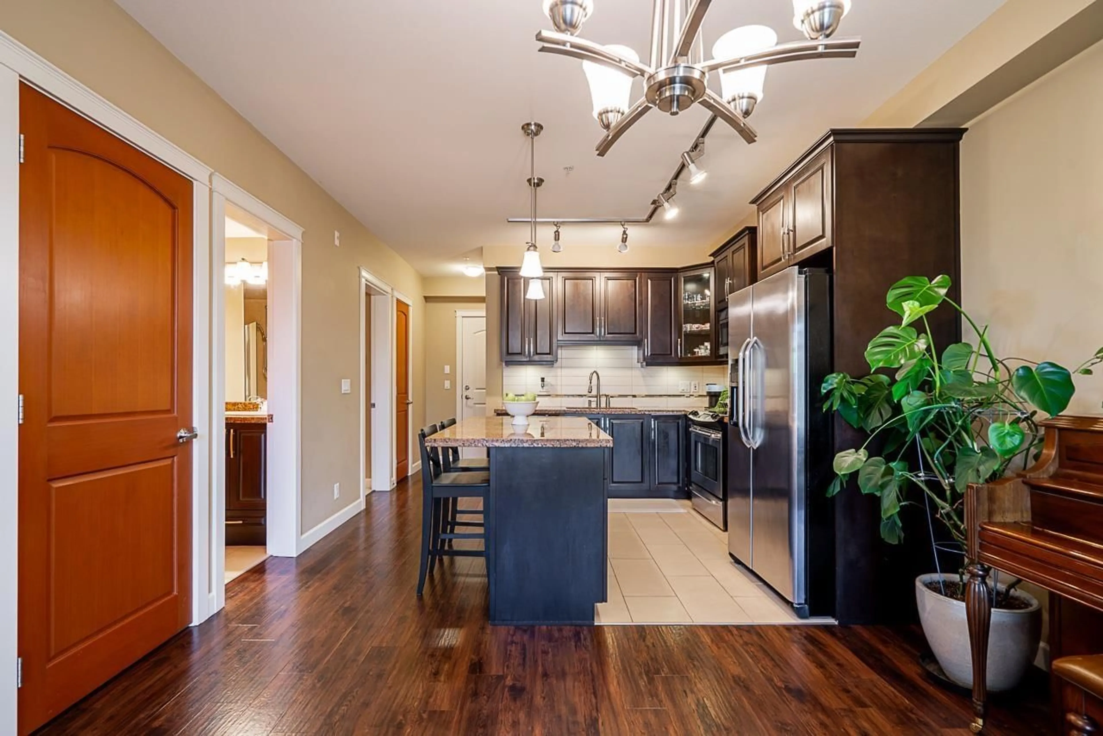 Open concept kitchen, wood/laminate floor for 266 - 8328 207A STREET, Langley British Columbia V2Y0K5