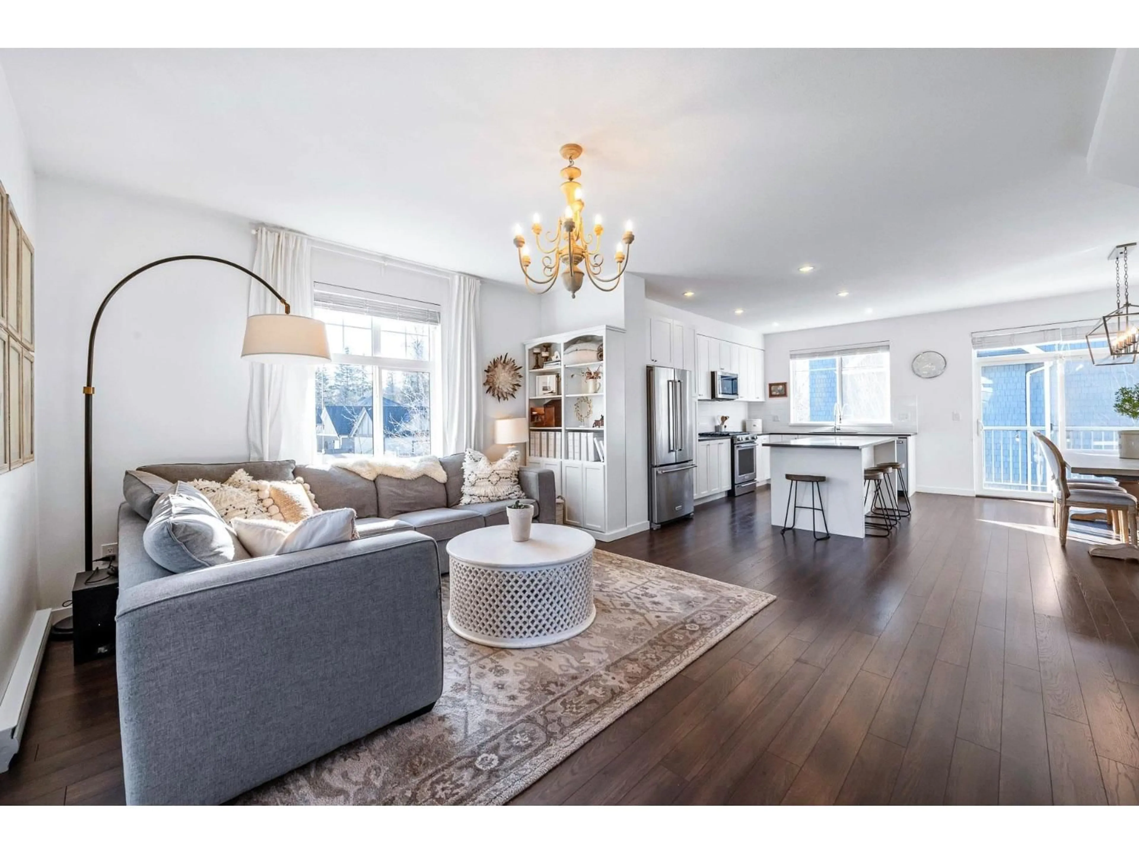 Living room with furniture, wood/laminate floor for 4 - 127 172 STREET, Surrey British Columbia V3Z0W9