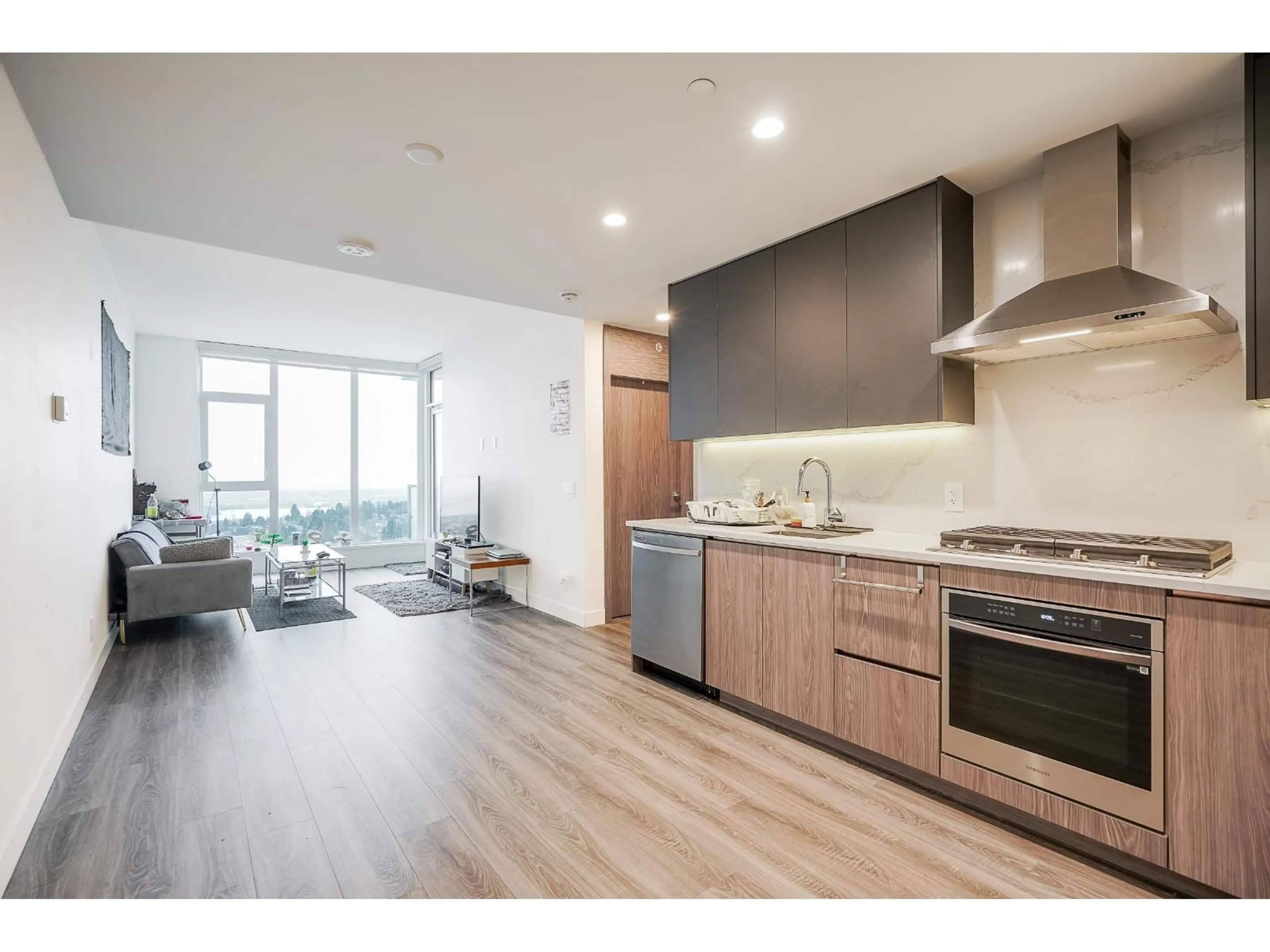 Open concept kitchen, wood/laminate floor for 1802 - 10750 135A STREET, Surrey British Columbia V3T0V4
