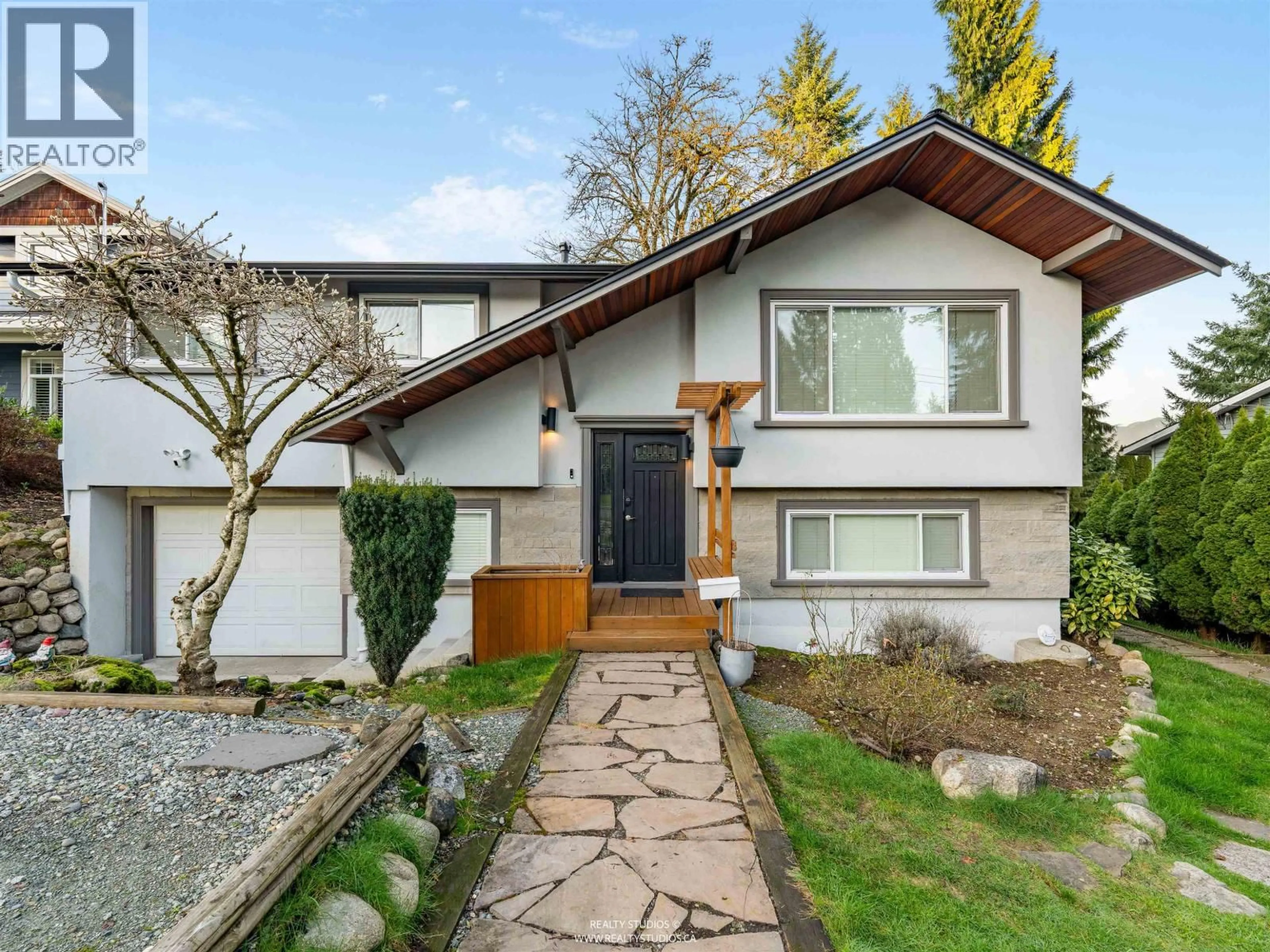 Home with vinyl exterior material, street for 4158 MT SEYMOUR PARKWAY, North Vancouver British Columbia V7G1C5