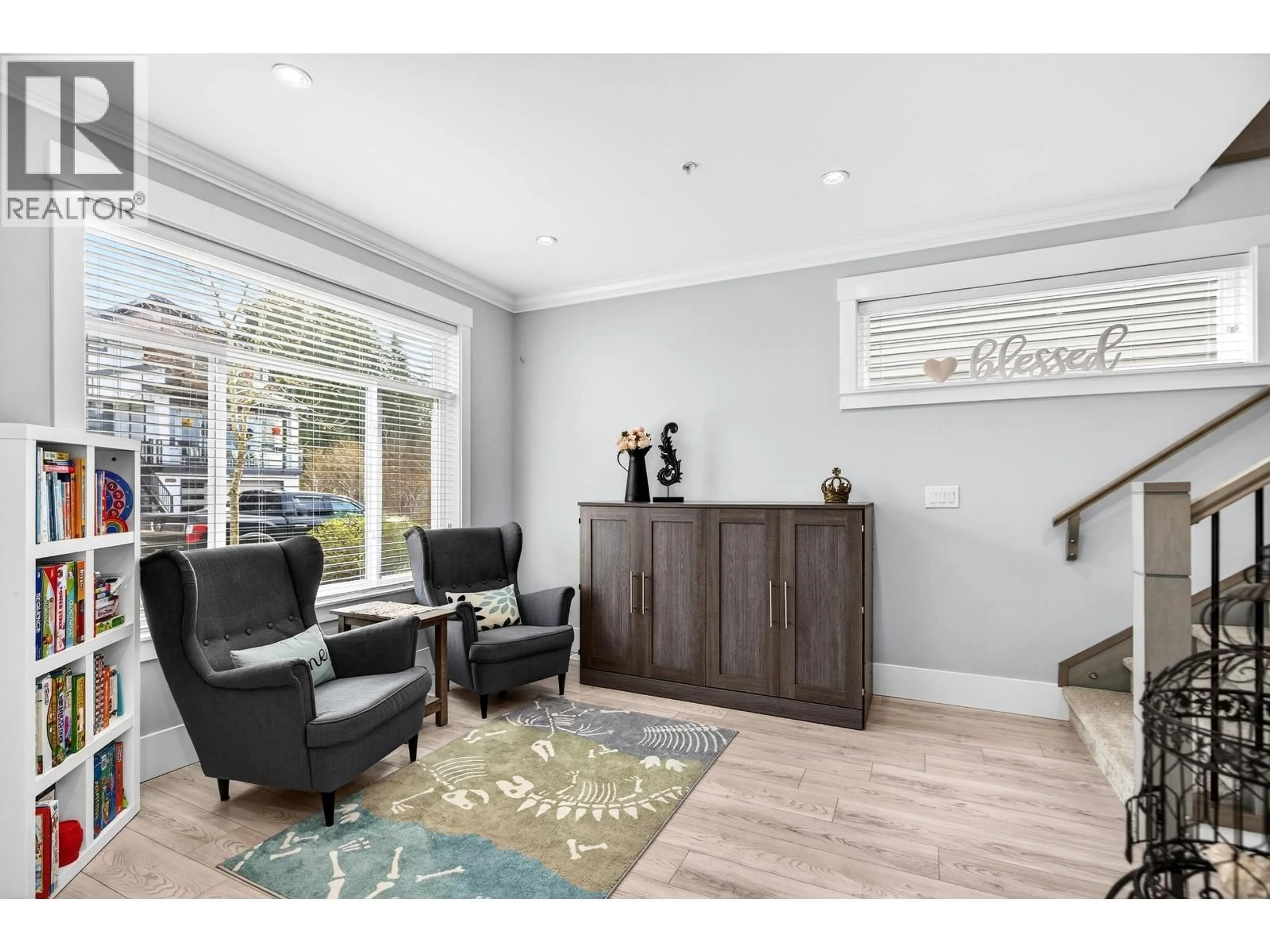 Living room with furniture, wood/laminate floor for 13687 232A STREET, Maple Ridge British Columbia V4R0H1